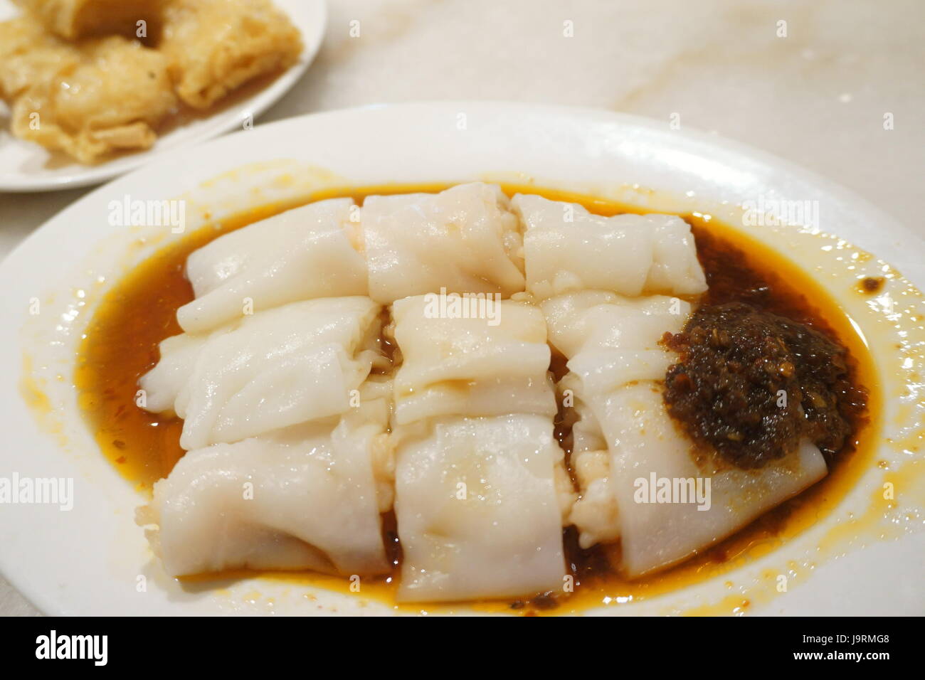 chee cheong fun, rice noodle roll a Cantonese dish from southern China including Hong Kong Stock Photo