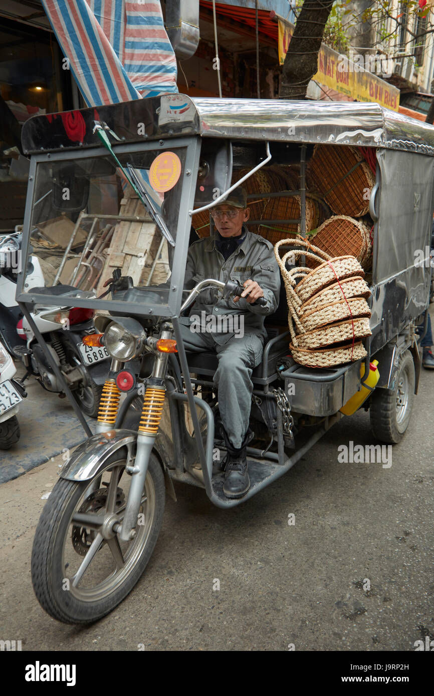 Tuktuk loaded with woven baskets, Old Quarter, Hanoi, Vietnam Stock Photo
