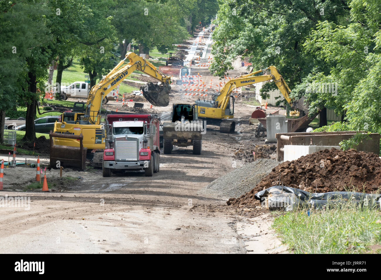 Road Construction Site With Excavators and FrontLoader Stock Photo - Alamy