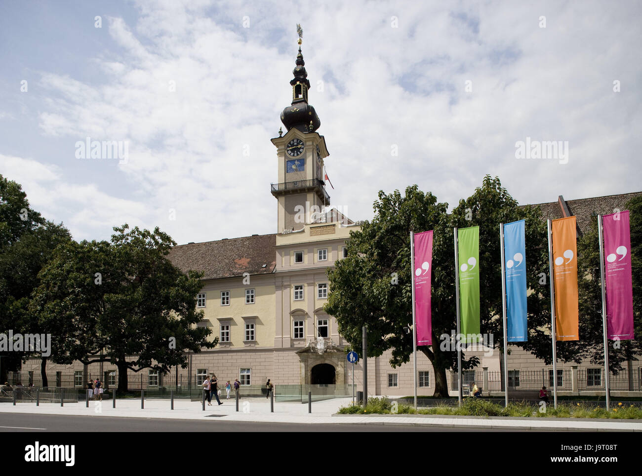 Austria,Upper Austria,Linz,country house,promenade,state capital,cultural capital,industrial town,architecture,structure,facade,house facade,building,art,culture,place of interest,destination,clouds,people,tourists,tower,flags,brightly,trees,Renaissance construction, Stock Photo