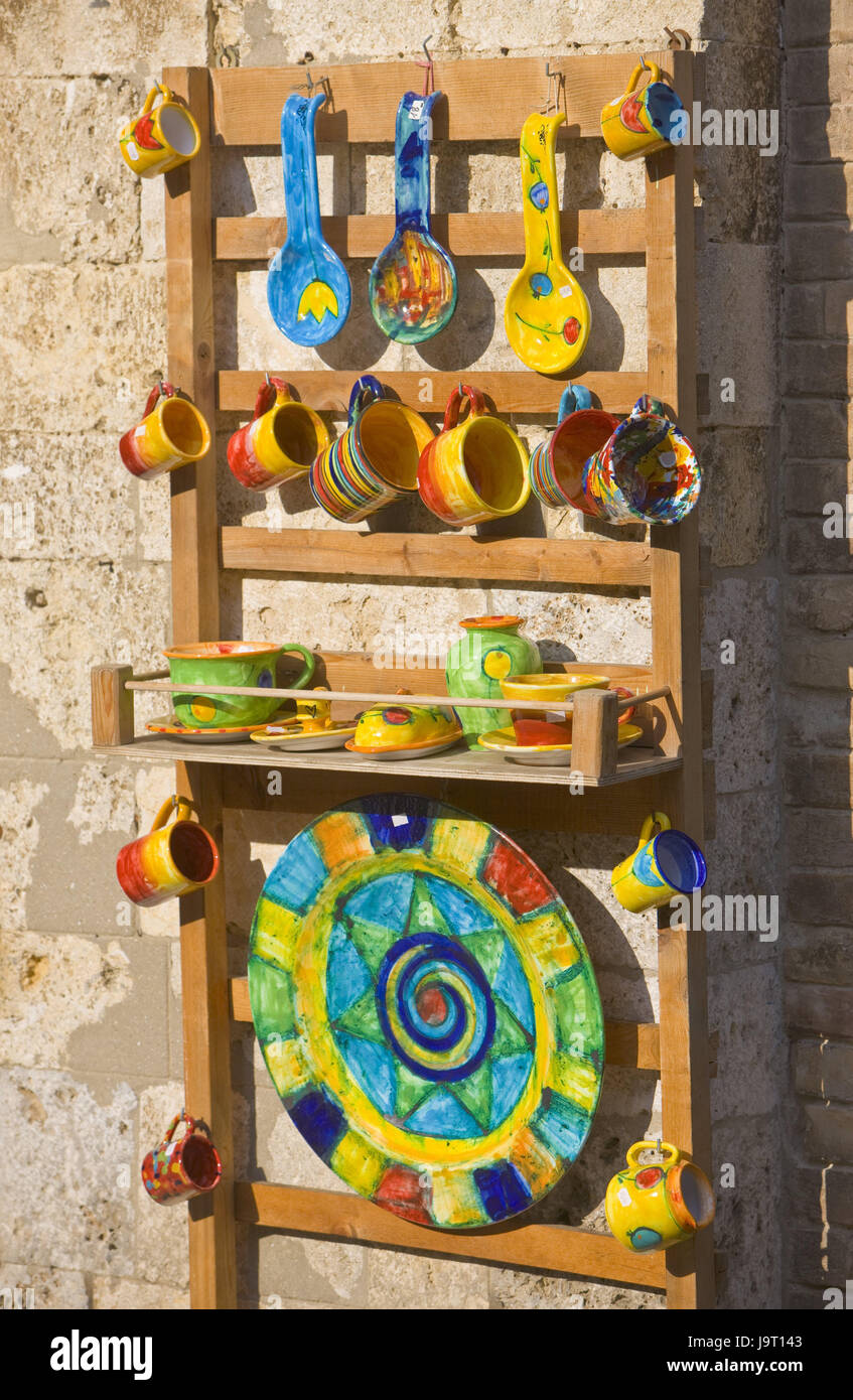 Italy,Tuscany,San Gimignano,Old Town,souvenir shop,detail,pottery,brightly,Europe,building,house,wall of a house,economy,trade,sales,business,loading,souvenirs,craft,handicraft,ceramics,dishes,glazes,stand,shelf,choice,colours,forms,tourism,nobody, Stock Photo