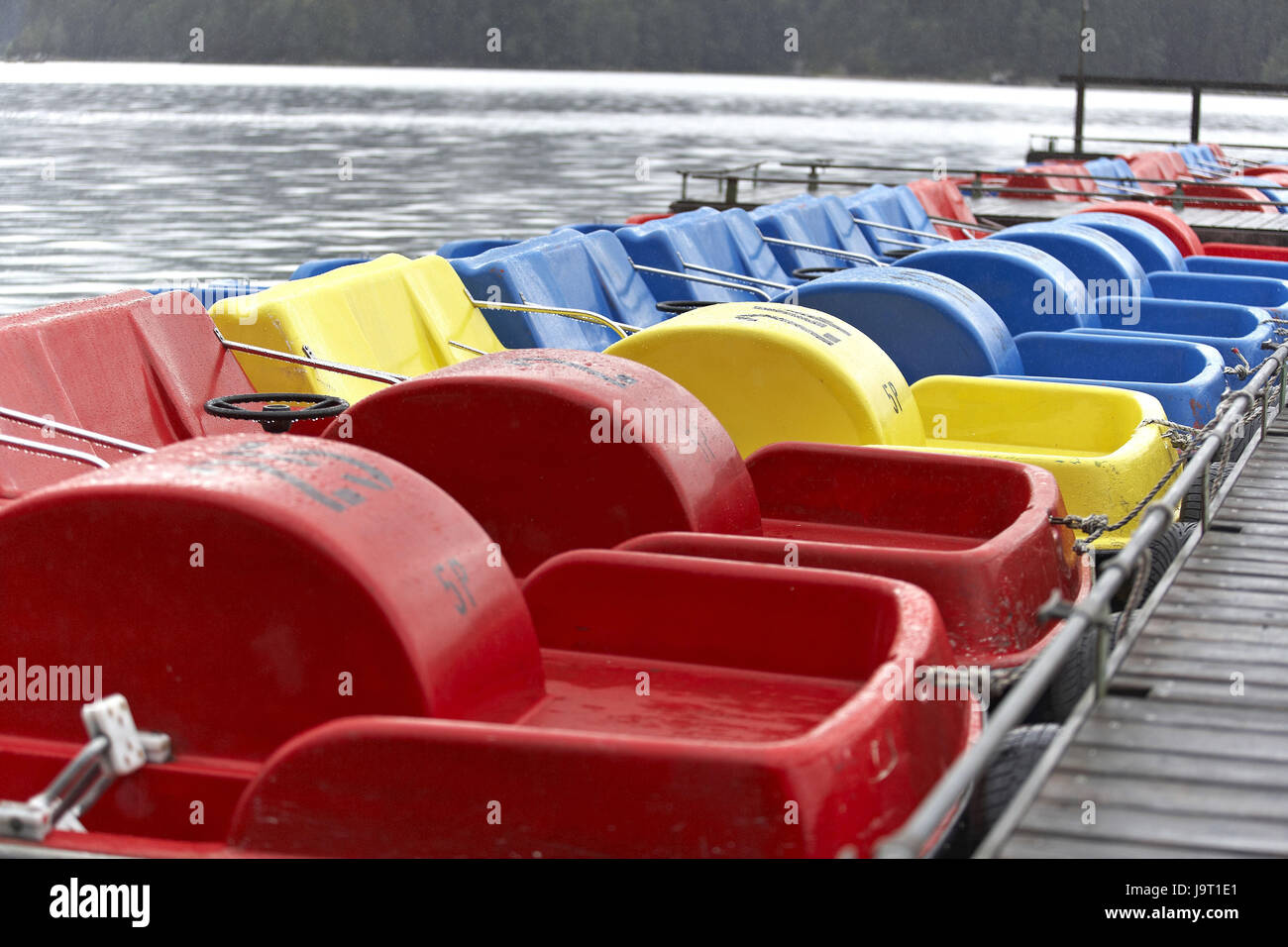 Landing stage,pedal boats,brightly Stock Photo Alamy