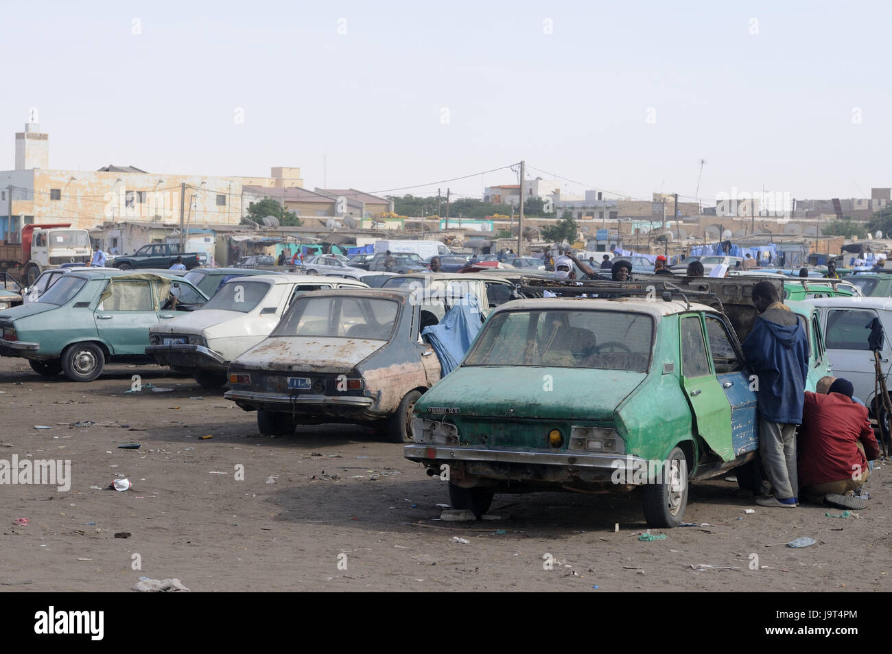 Mauritania,Nouakchott,taxi stand,cars,old,men,Africa,West Africa,town,capital,economy,service,taxis,vehicles,Renault,dilapidatedly,rust bowers,people,locals,non-whites,outside, Stock Photo
