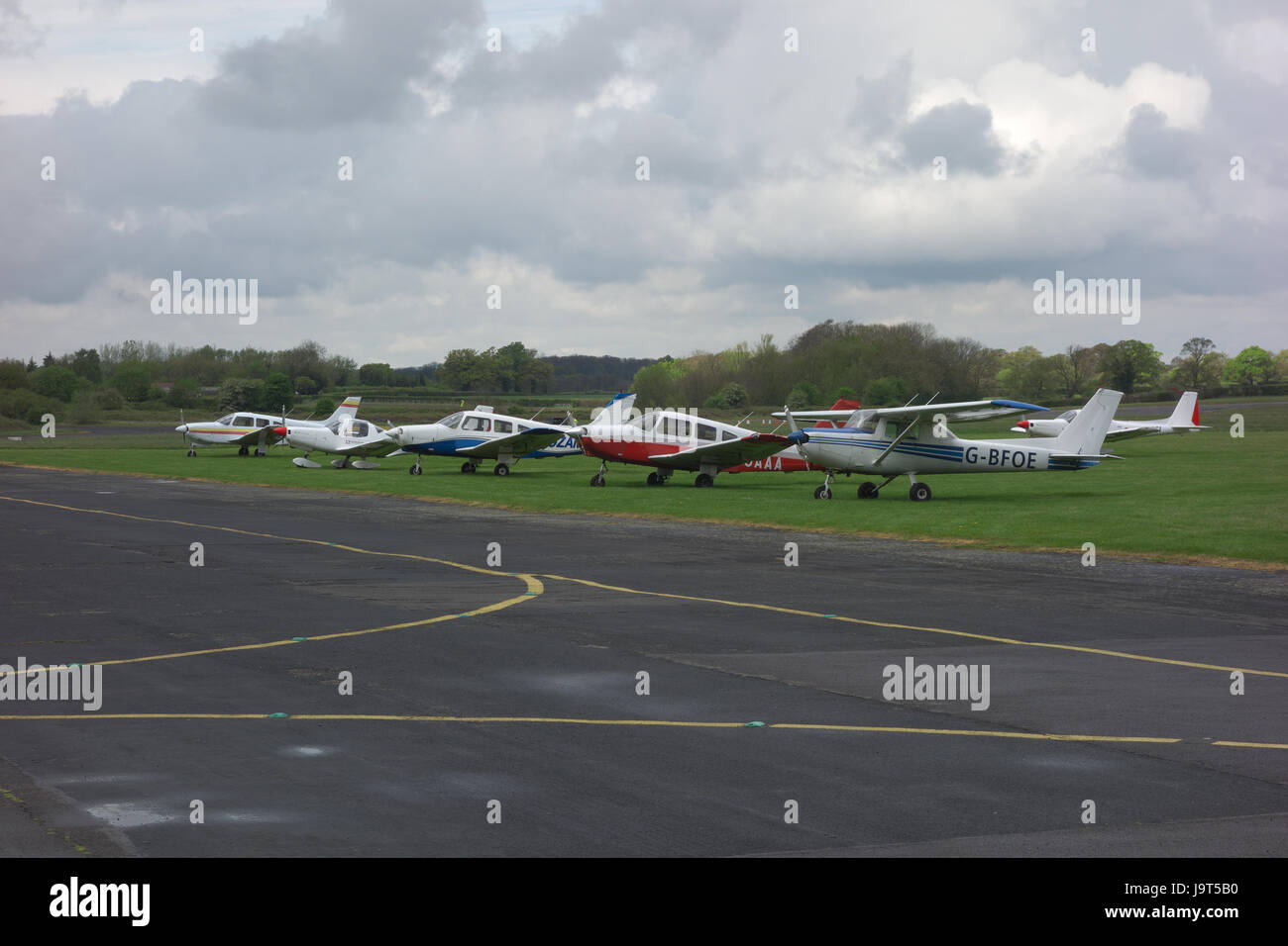 Light Aircraft Parked On Grass At Wolverhampton Halfpenny Green Airport light-aircraft-parked-on-grass-at-wolverhampton-halfpenny-green-airport
