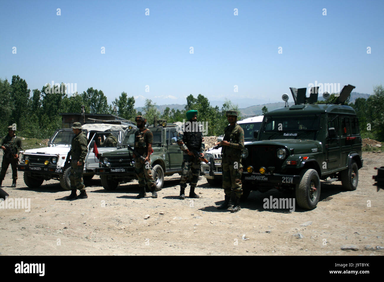 Srinagar-Jammu highway, Kashmir. 2nd June, 2017. 2  army men killed and five others injured on Saturday after militants attacked an army convoy in Lower Munda in south Kashmir's Anantnag district. Reports said that militants opened fire on the convoy moving on the Srinagar-Jammu highway near Qazigund, resulting into injuries to six troopers. The injured were shifted to a hospital for treatment where two of them succumbed. A search operation was launched in the area to nab the attackers Credit: Aherif Gulzar Wani/Alamy Live News Stock Photo