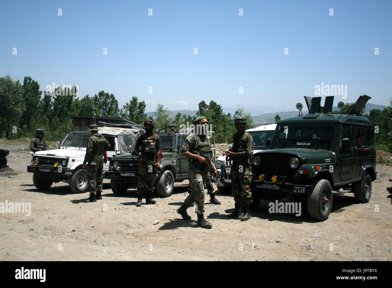 Srinagar-Jammu highway, Kashmir. 2nd June, 2017. 2  army men killed and five others injured on Saturday after militants attacked an army convoy in Lower Munda in south Kashmir's Anantnag district. Reports said that militants opened fire on the convoy moving on the Srinagar-Jammu highway near Qazigund, resulting into injuries to six troopers. The injured were shifted to a hospital for treatment where two of them succumbed. A search operation was launched in the area to nab the attackers Credit: Aherif Gulzar Wani/Alamy Live News Stock Photo