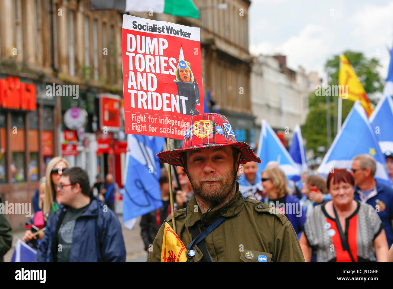 Glasgow, Scotland, UK. 3rd June, 2017. Several thousand supporters of 'Wings Over Scotland', a collection of political groups that are pro-independence, pro- SNP, pro-Scottish Resistance, anti-Unionism and anti-Conservative held a rally through Glasgow city centre. Generally the parade was vocally loud and good natured until it met with a small ad-hoc group of supporters for Unionism in George Square and then the police had to intervene and separate the two factions to prevent disorder. Credit: Findlay/Alamy Live News Stock Photo