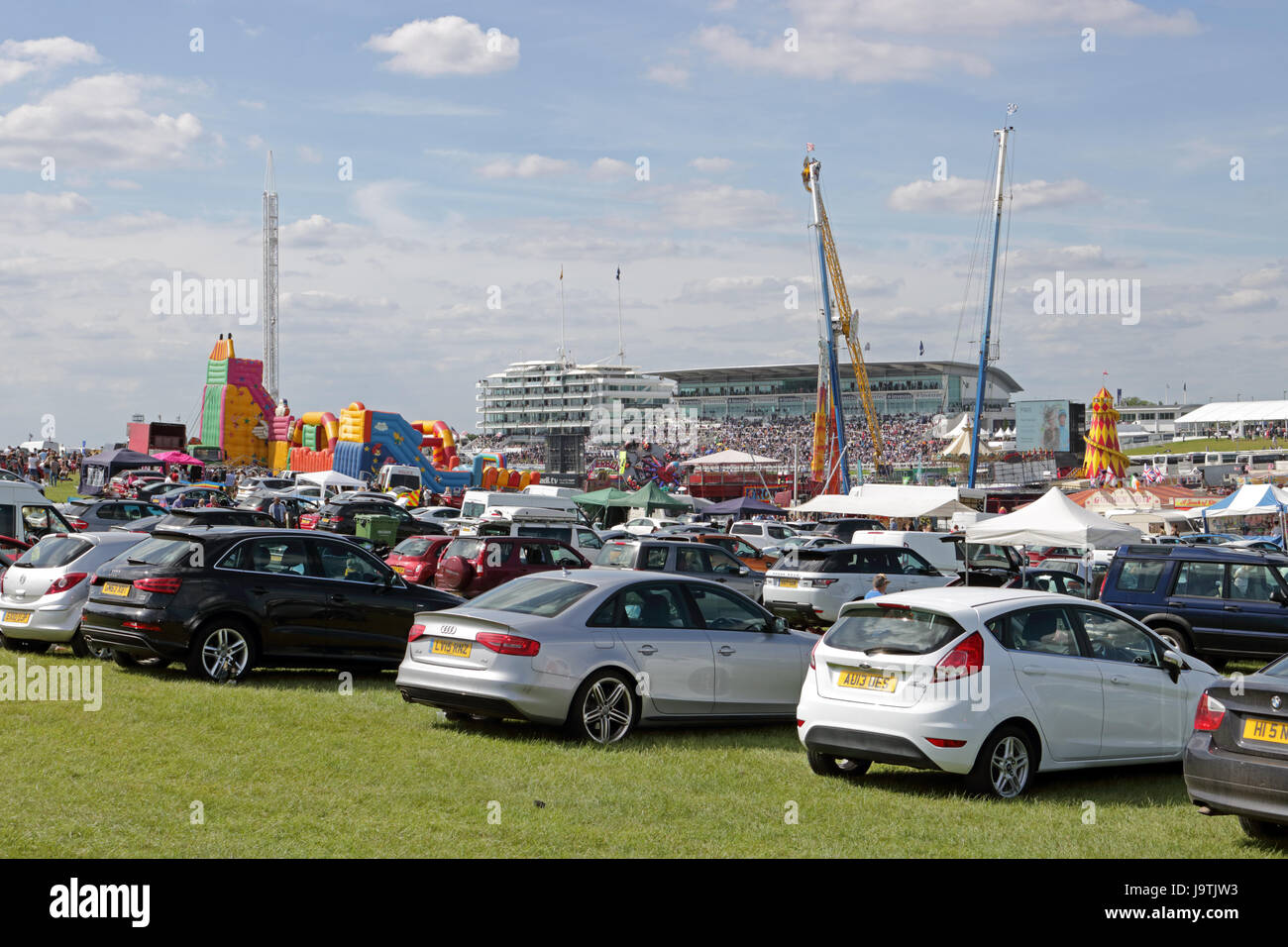 Epsom Downs, Surrey, UK. 3rd June, 2017. Colourful scenes on Derby Day at Epsom Downs in Surrey. The inside of the racecoures contains a fun fare, market and carparking. Credit: Julia Gavin UK/Alamy Live News Stock Photo