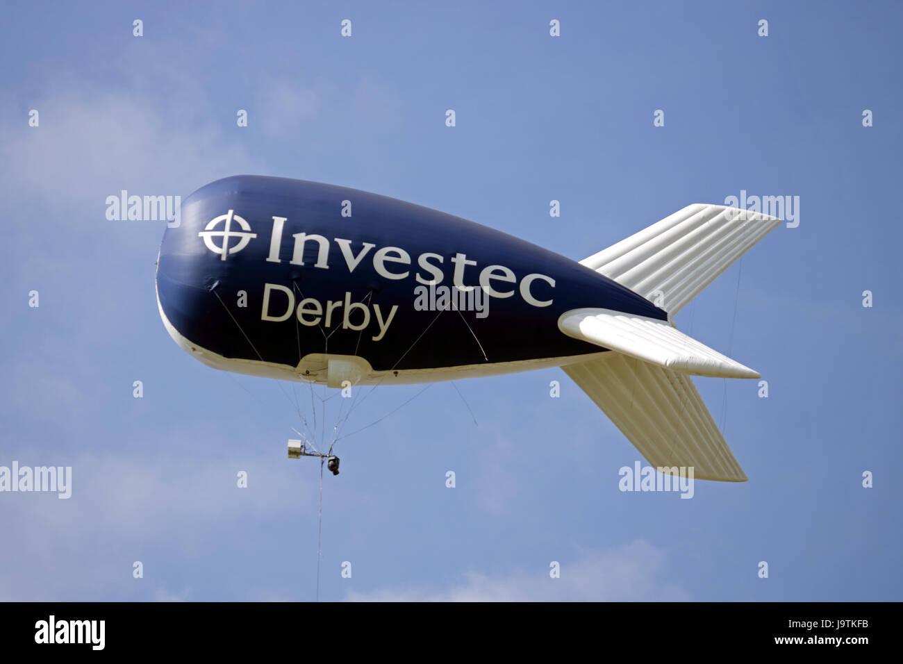 Epsom Downs, Surrey, UK. 3rd June 2017. The Investec blimp tethered over the racecourse on Derby Day at Epsom Downs in Surrey. Stock Photo