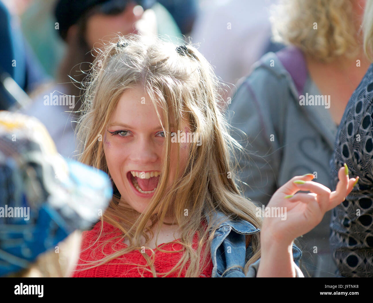 Exeter, UK. 3rd June, 2017. Girl dancing with her friends to the band Revelation Roots on the Saturday at Exeter Respect Festival2017 at Belmont Park, Exeter, UK Credit: Clive Chilvers/Alamy Live News Stock Photo