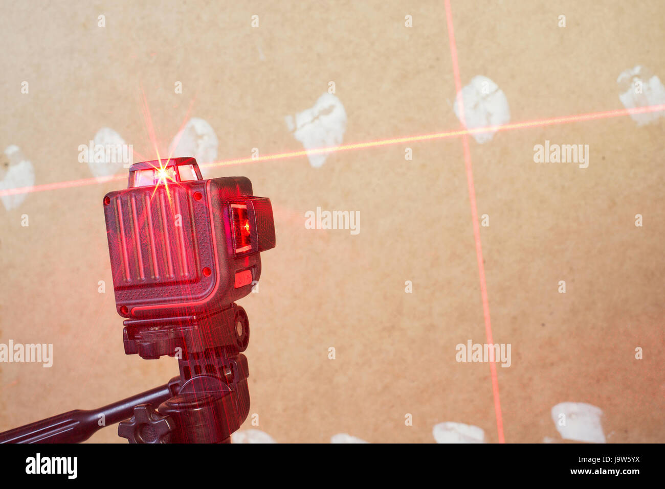 Laser level measuring tool in construction site Stock Photo Alamy