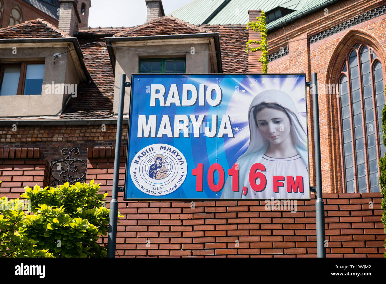 Radio Maria radio station poster outside cathedral Basilica of St. James the Apostle in Szczecin, Poland. Stock Photo