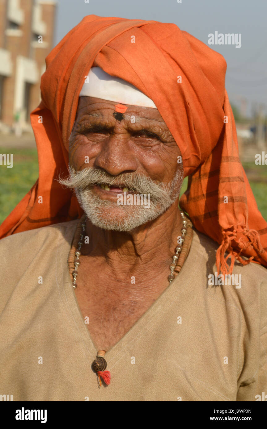 Old farmer with a wrinkled face near Pune, Maharashtra. Stock Photo