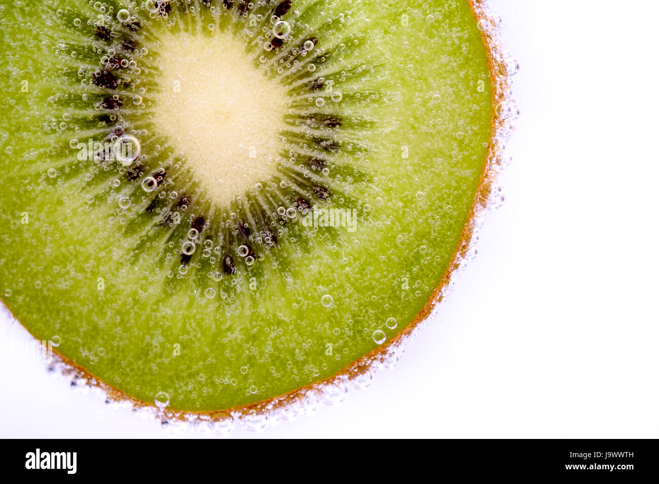 Half sliced kiwifruit Stock Photo