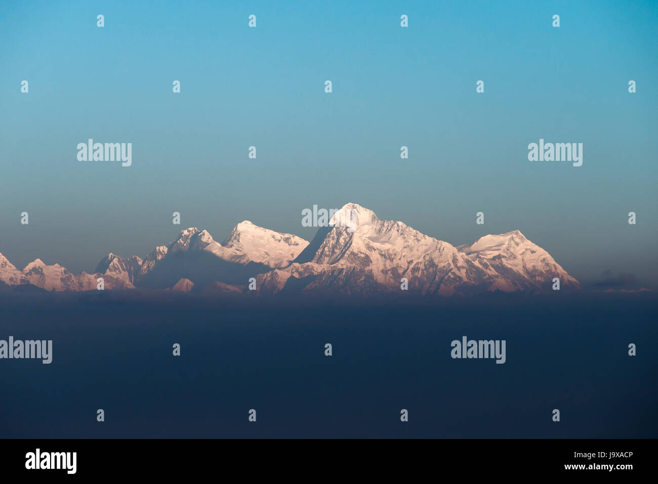 Mountain peaks including Lhotse, Everest, Makalu and Chomolonzo, viewed from Sandakphu, Darjeeling, India Stock Photo