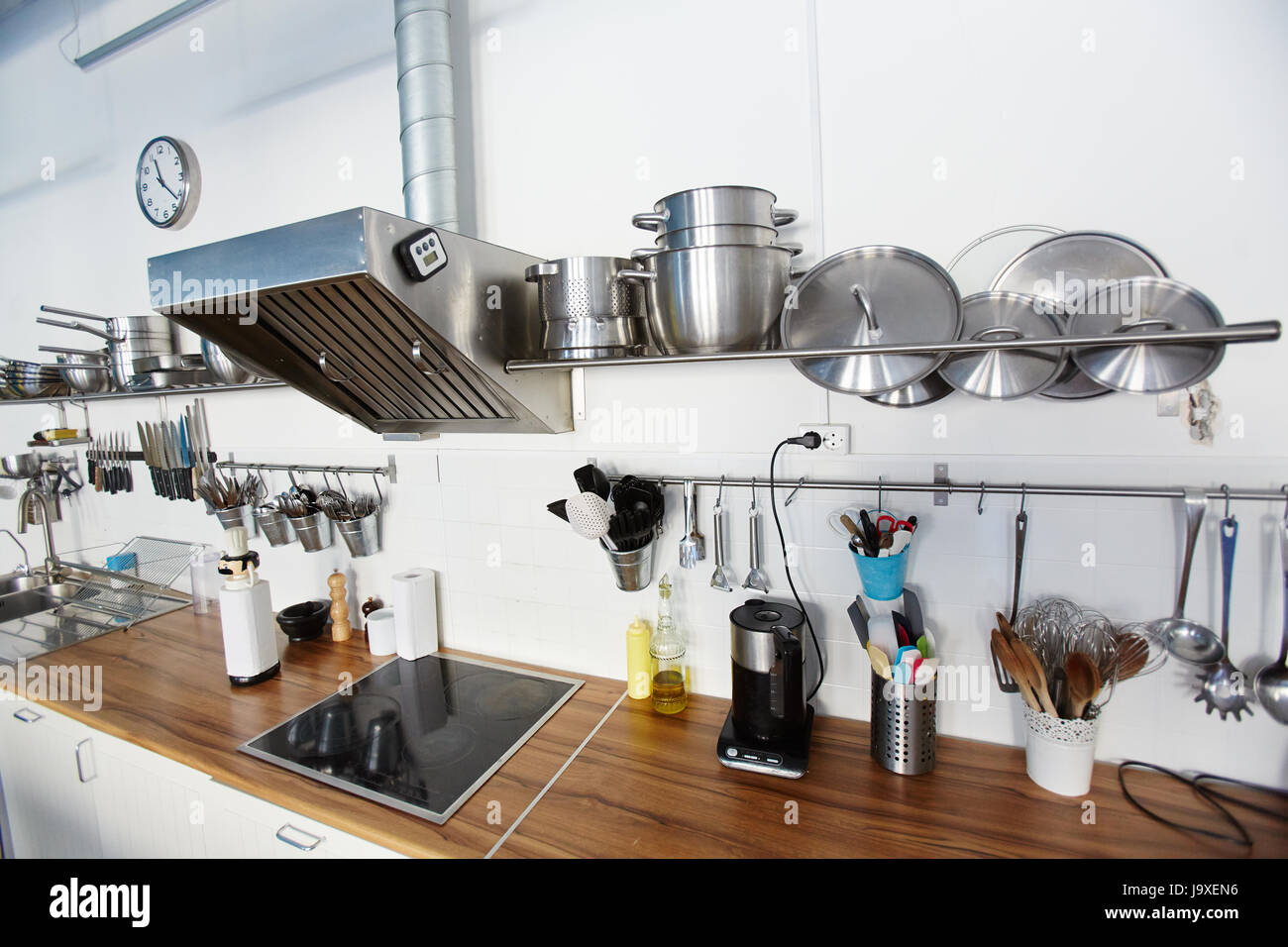 Interior of modern kitchen with various utensils Stock Photo - Alamy