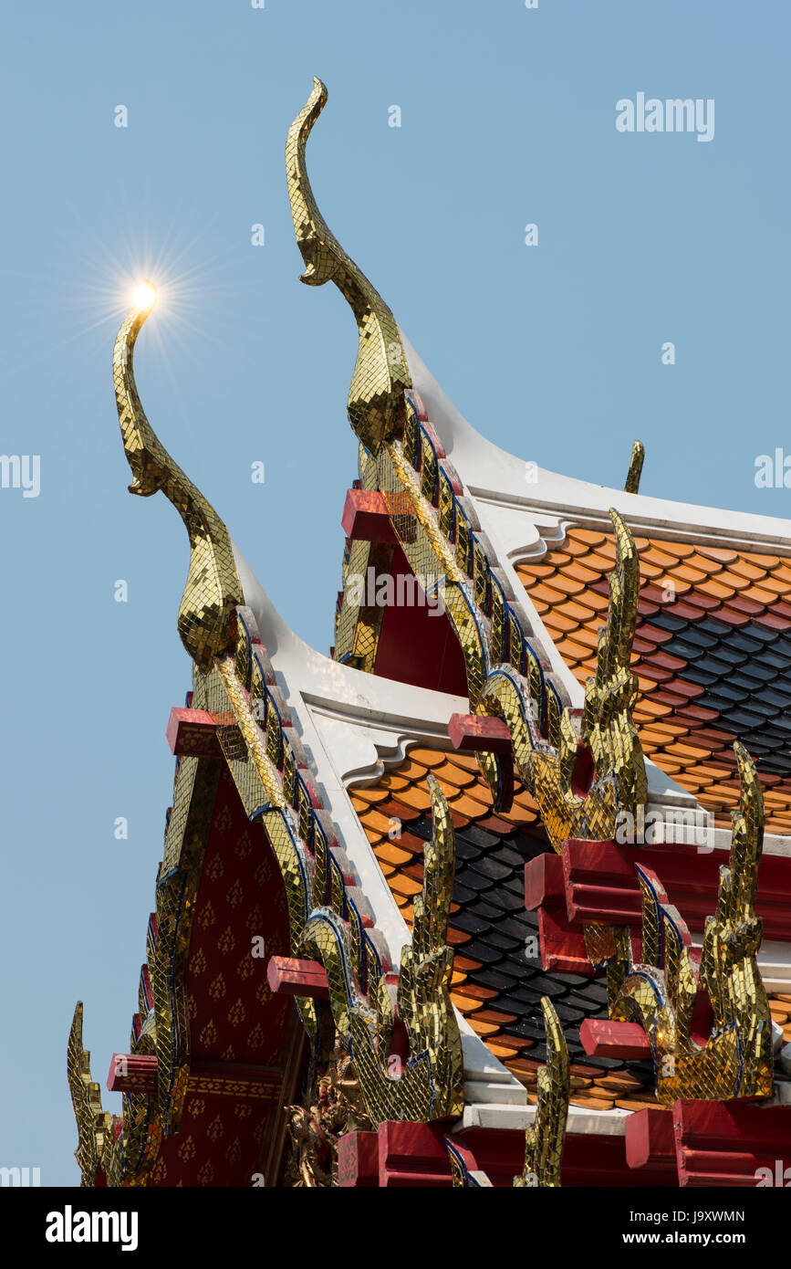 Sunlight catches a mosaic-covered finial at Wat Pho, Bangkok, Thailand Stock Photo