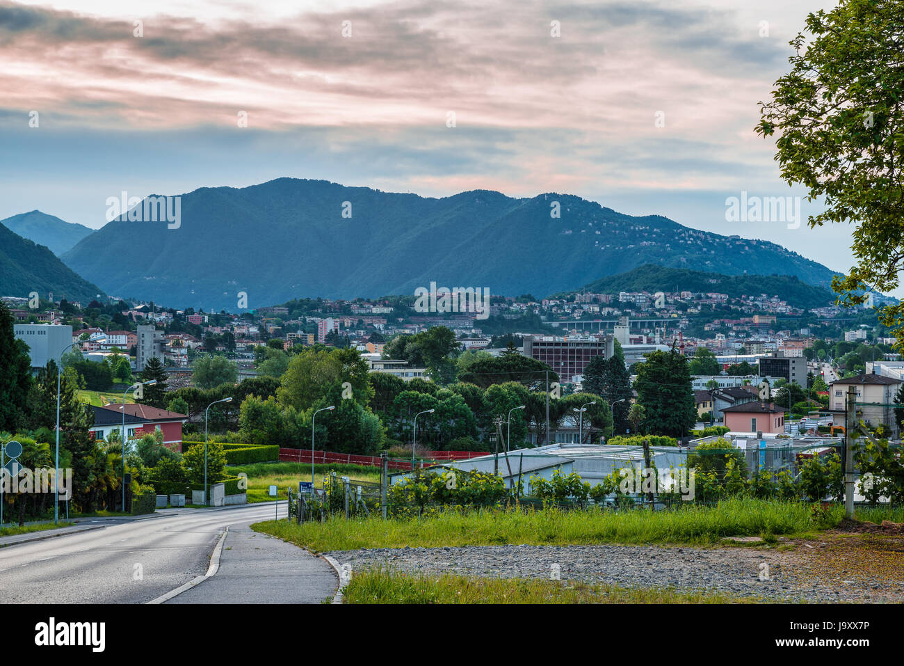 Chiasso, Ticino canton, Switzerland. View of the town of Italian Switzerland in the district of Mendrisio, from above, in the early morning Stock Photo