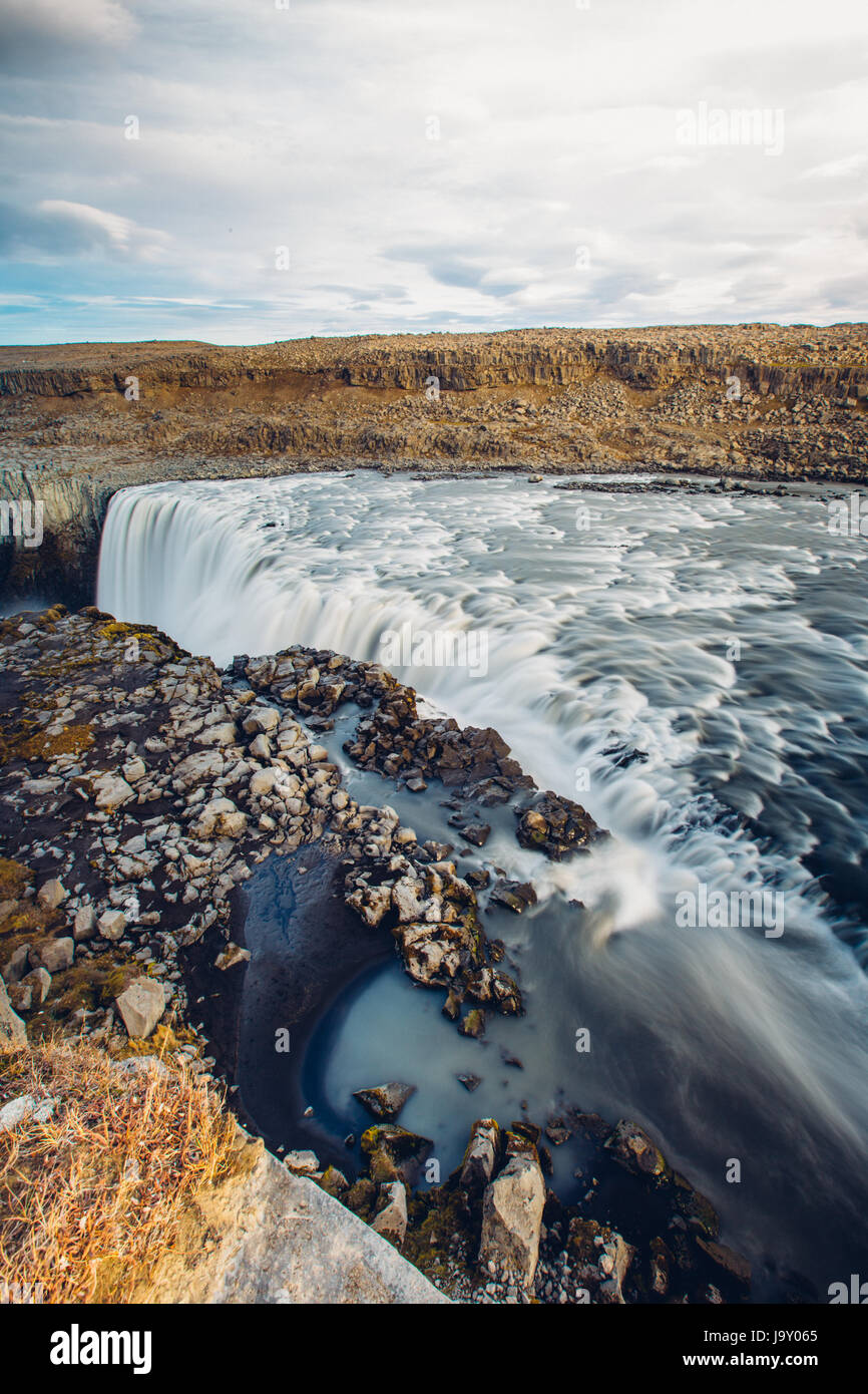 Water rushing over the top of Dettifoss, Iceland. Stock Photo