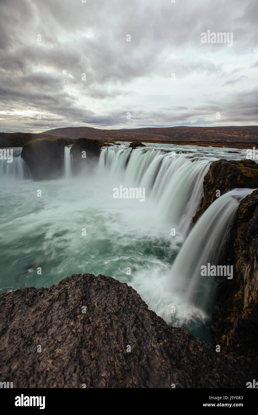 Long exposure of the river falling over Godafoss in Iceland on the Ring Road. Stock Photo
