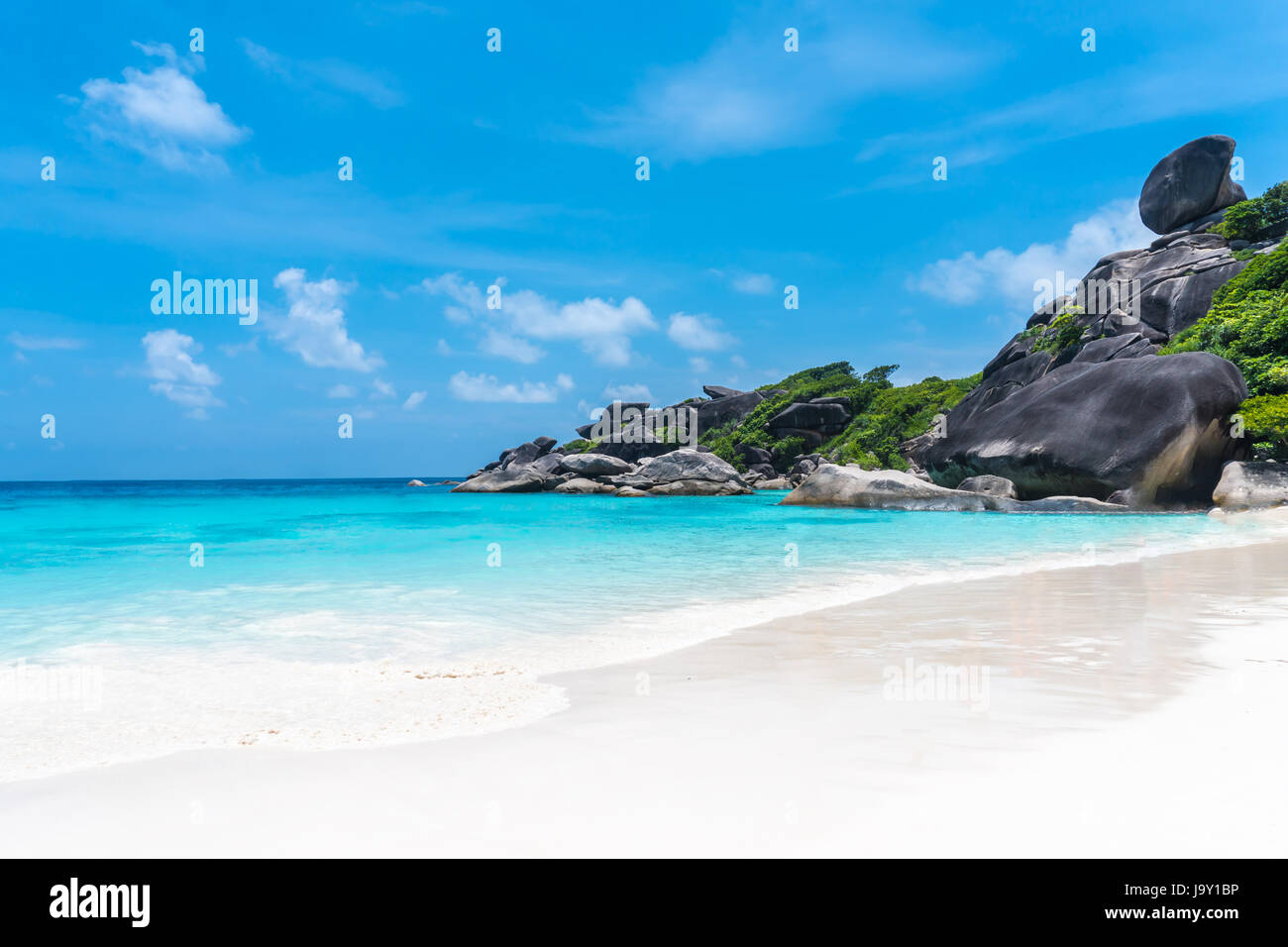Beautiful view with blue sky and clouds, blue sea and white sand beach ...