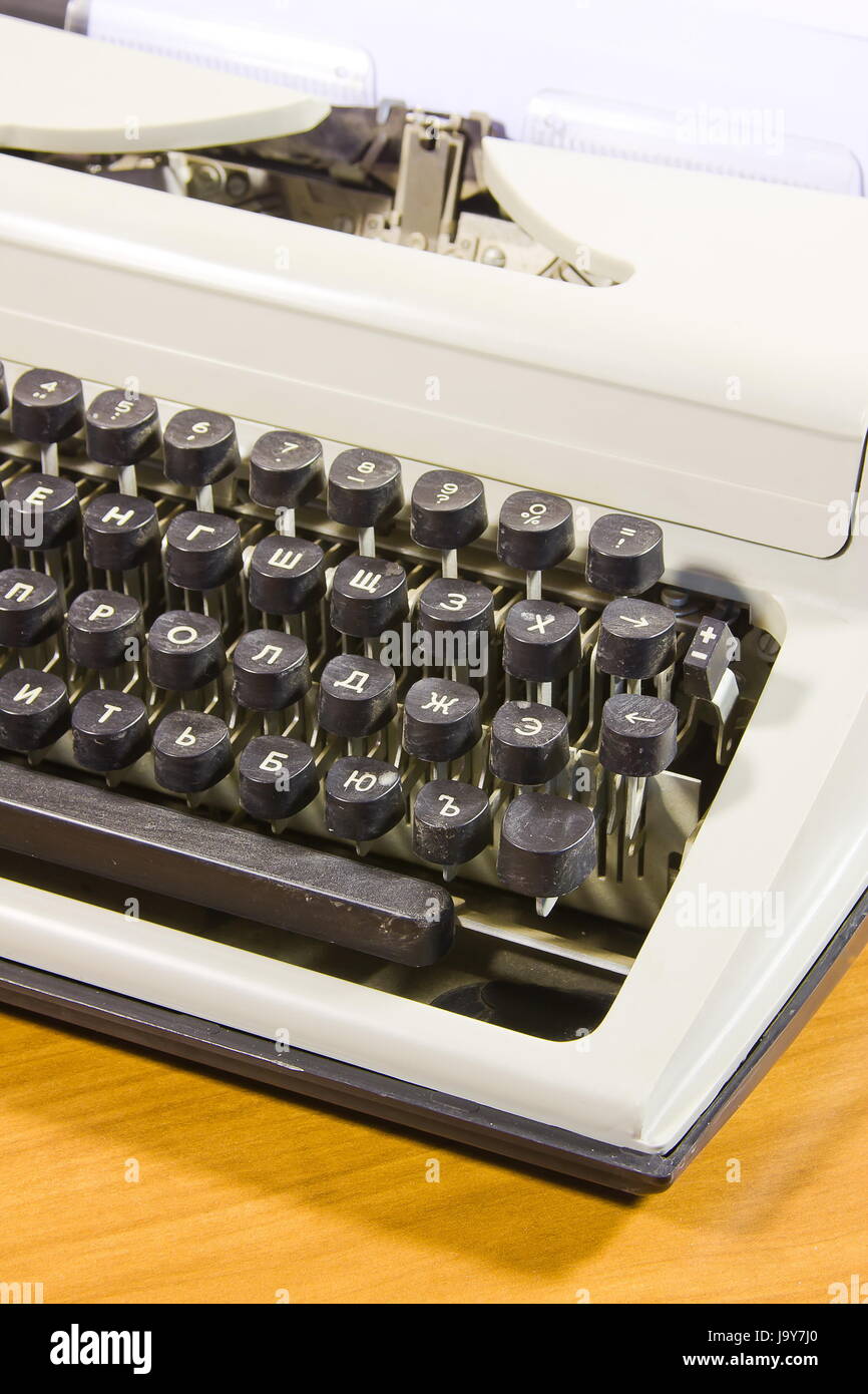 old typewriter and clean sheet of paper Stock Photo Alamy