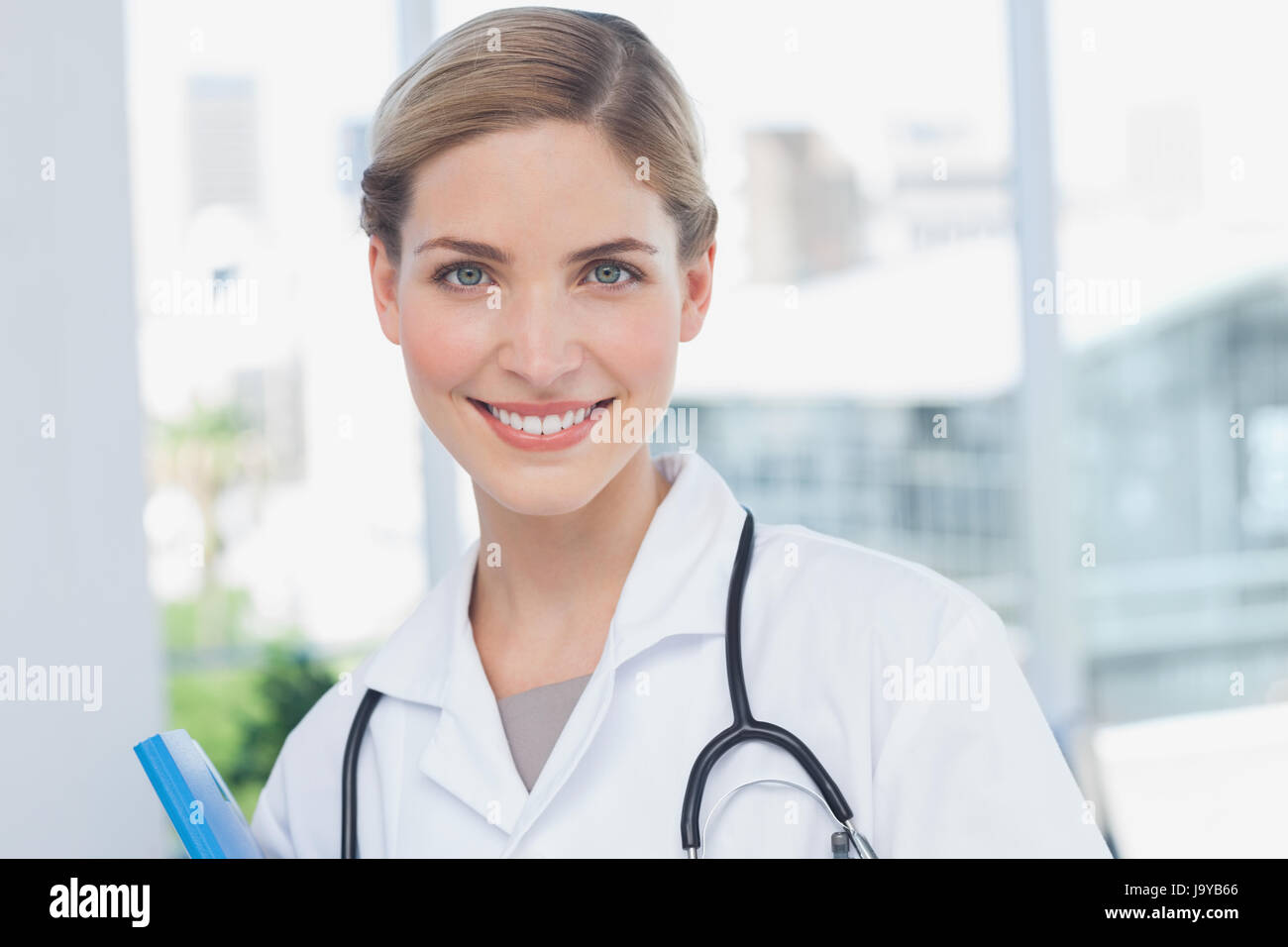 Pretty young nurse blonde hair hi-res stock photography and images - Alamy