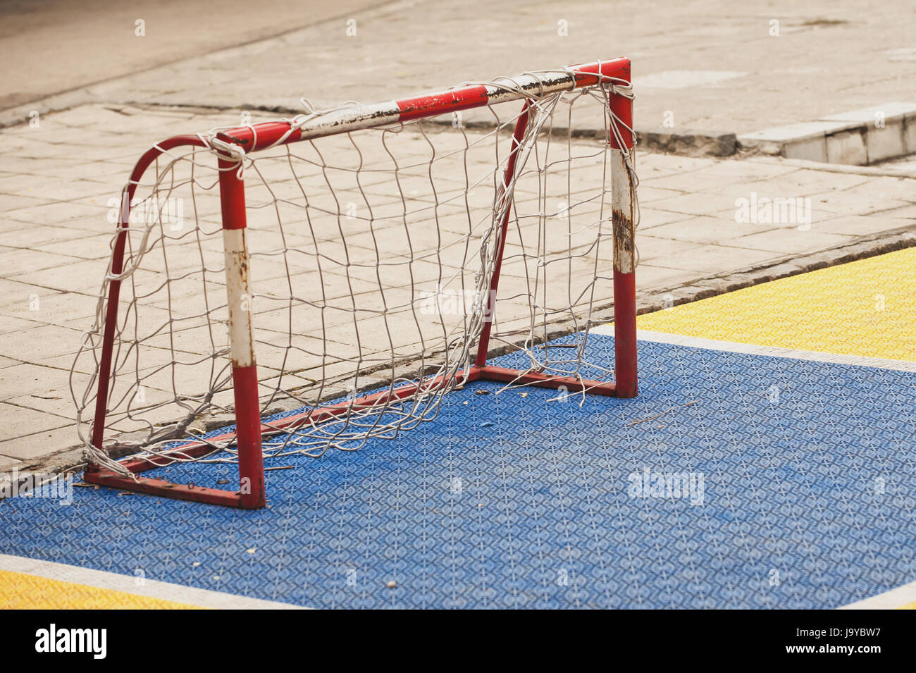 Small soccer field with mini football goal on the children playground