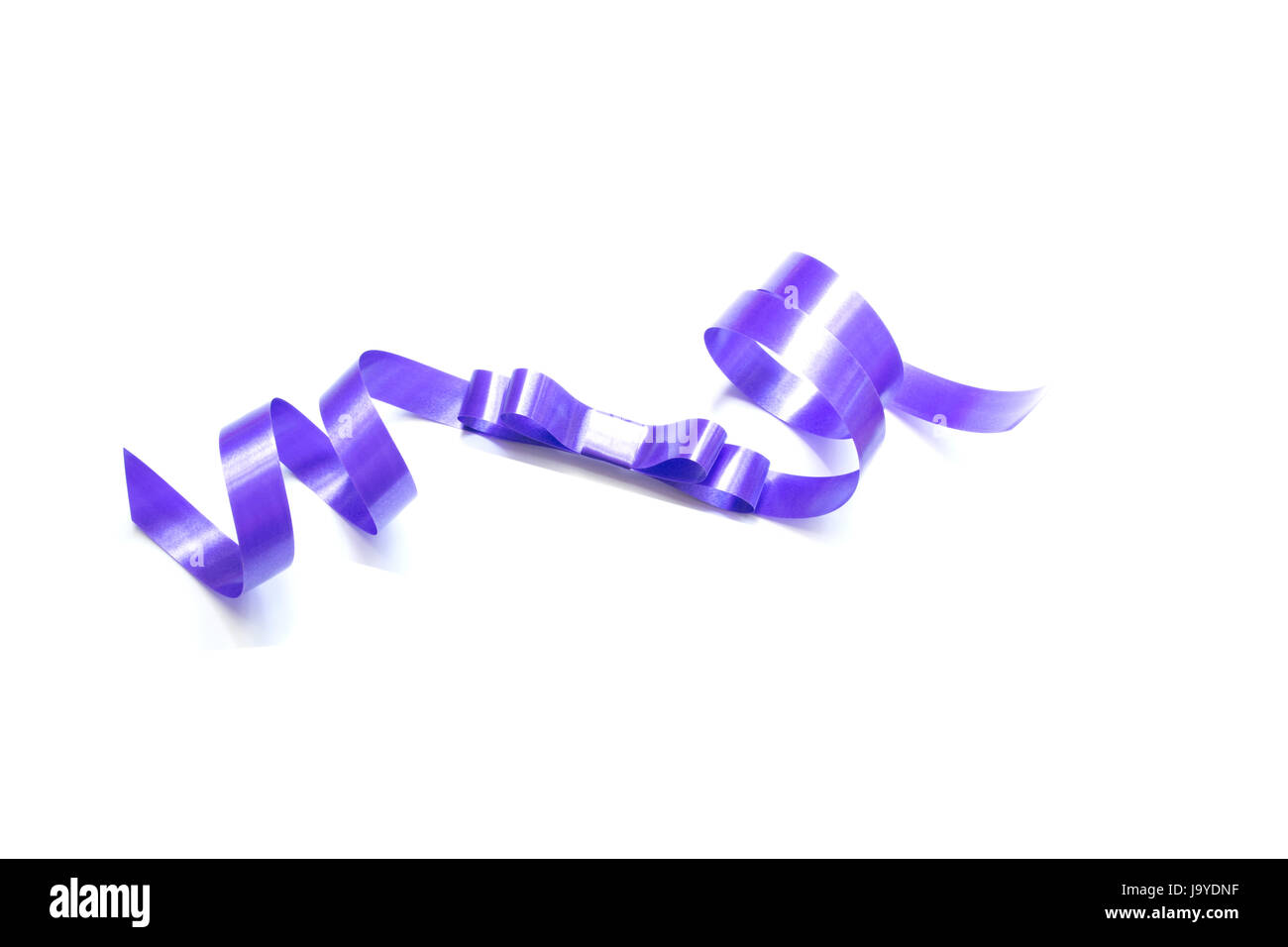 the spiral purple ribbon isolated on white background Stock Photo - Alamy