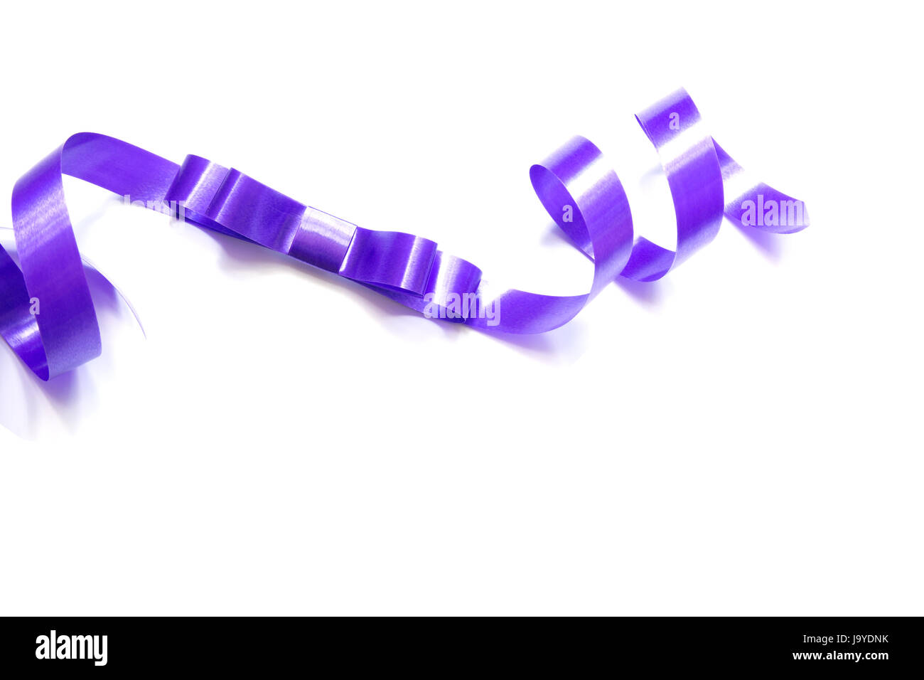the spiral purple ribbon isolated on white background Stock Photo - Alamy