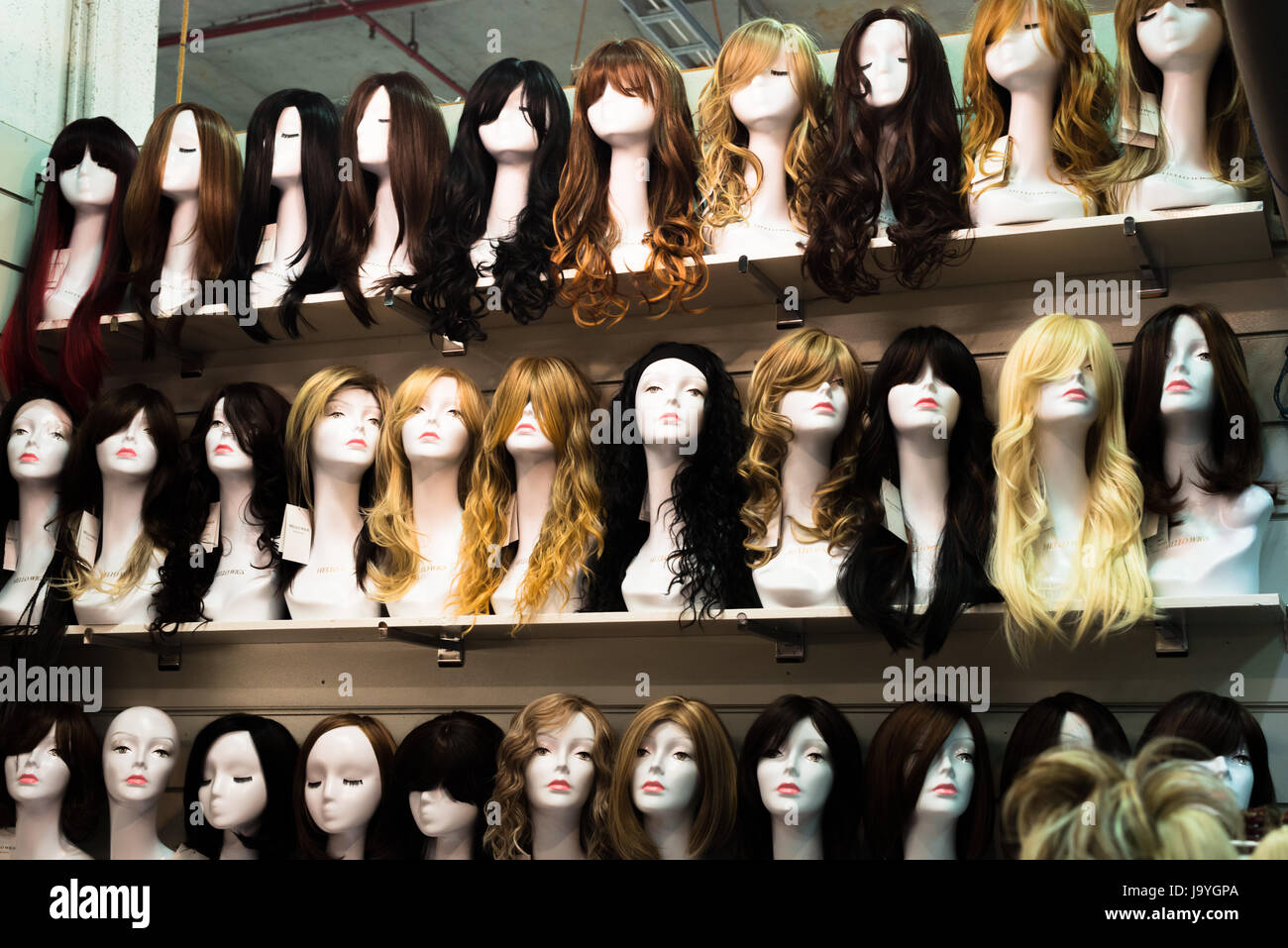 Wig mannequins at Paddy's market, Sydney, Australia. Stock Photo