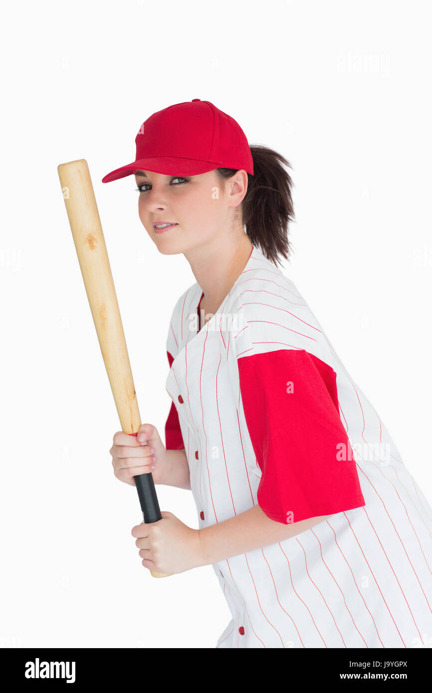 Woman holding bat cap hires stock