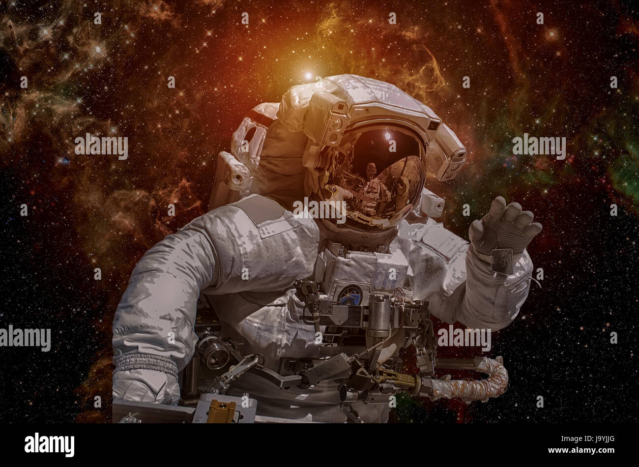 Astronaut in outer space. Elements of this image furnished by NASA. Stock Photo