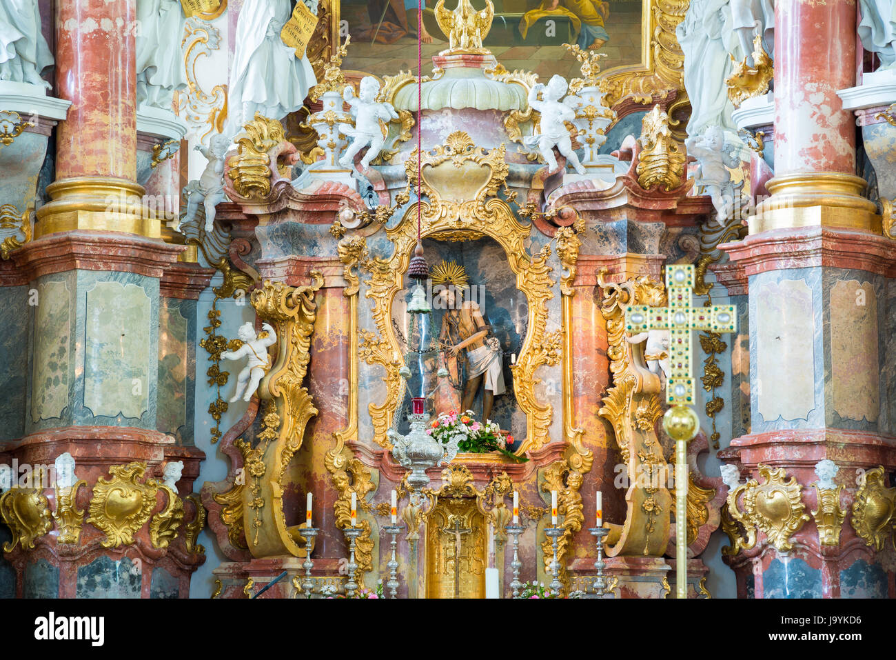 Steingaden, Germany - June 5, 2016: Altar with Jesus. Interior of Pilgrimage Church of Wies. It is an oval rococo church, designed in the late 1740s b Stock Photo
