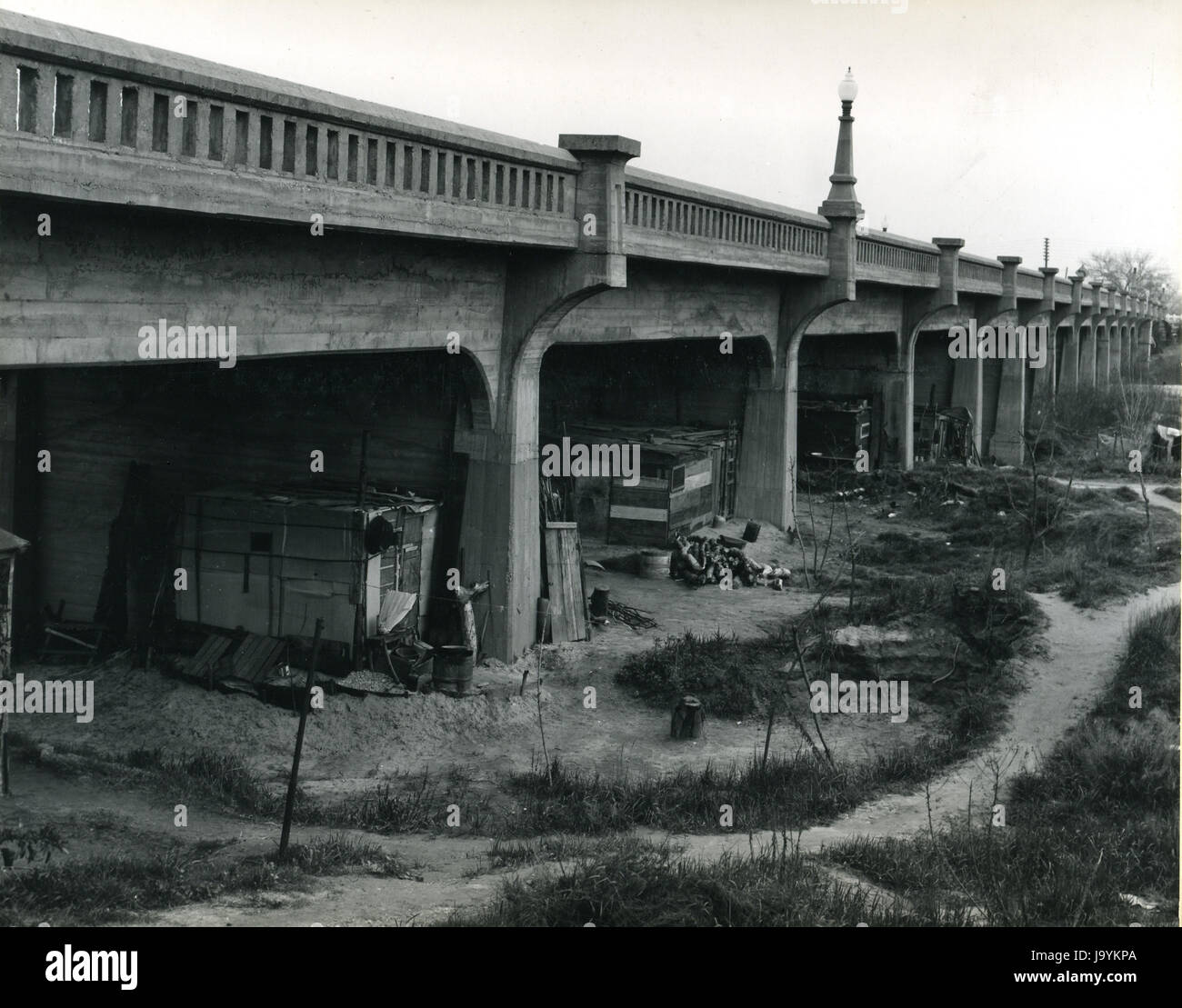 Marysville, California, February 20, 1940 - Squatter shacks under the D Street Bridge during the Great Depression. Photo by Dorothea Lange Stock Photo