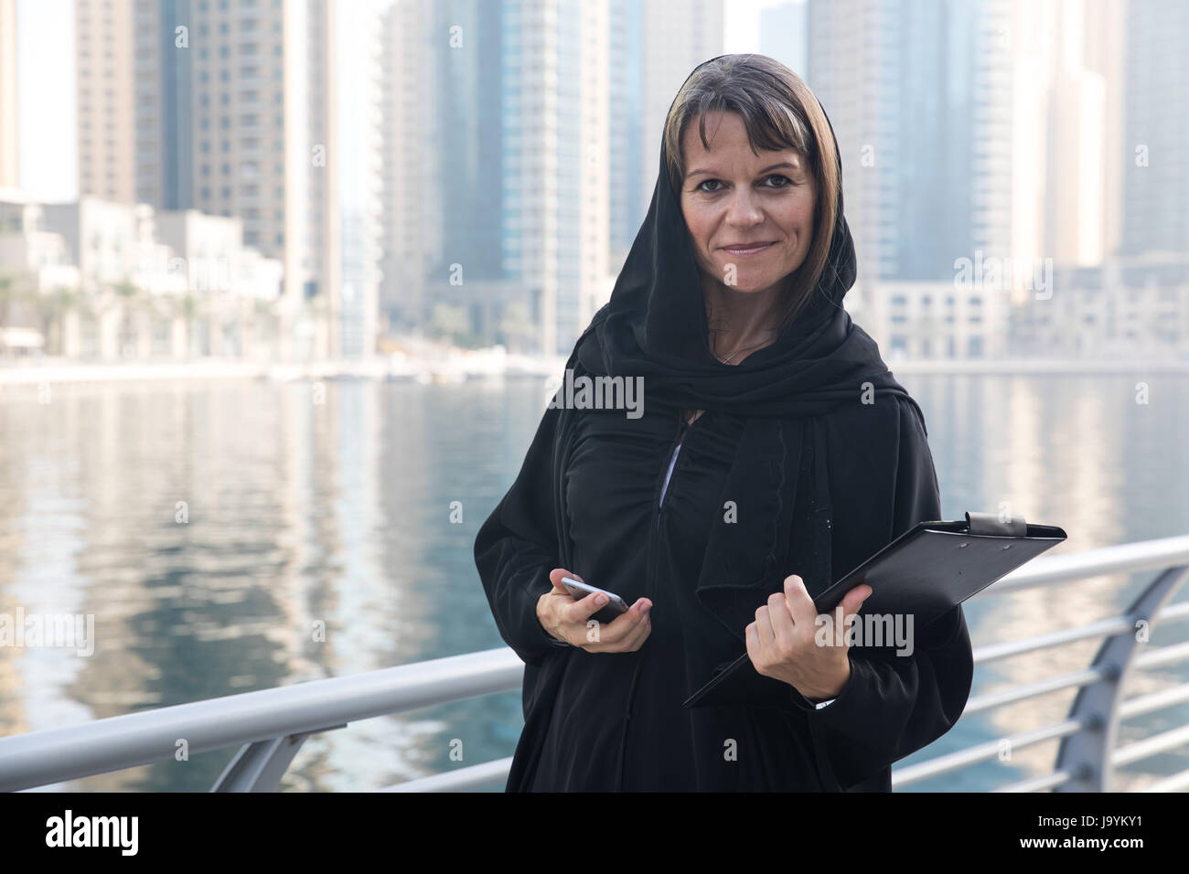 Professional business woman in a traditional emirati abaya. Stock Photo