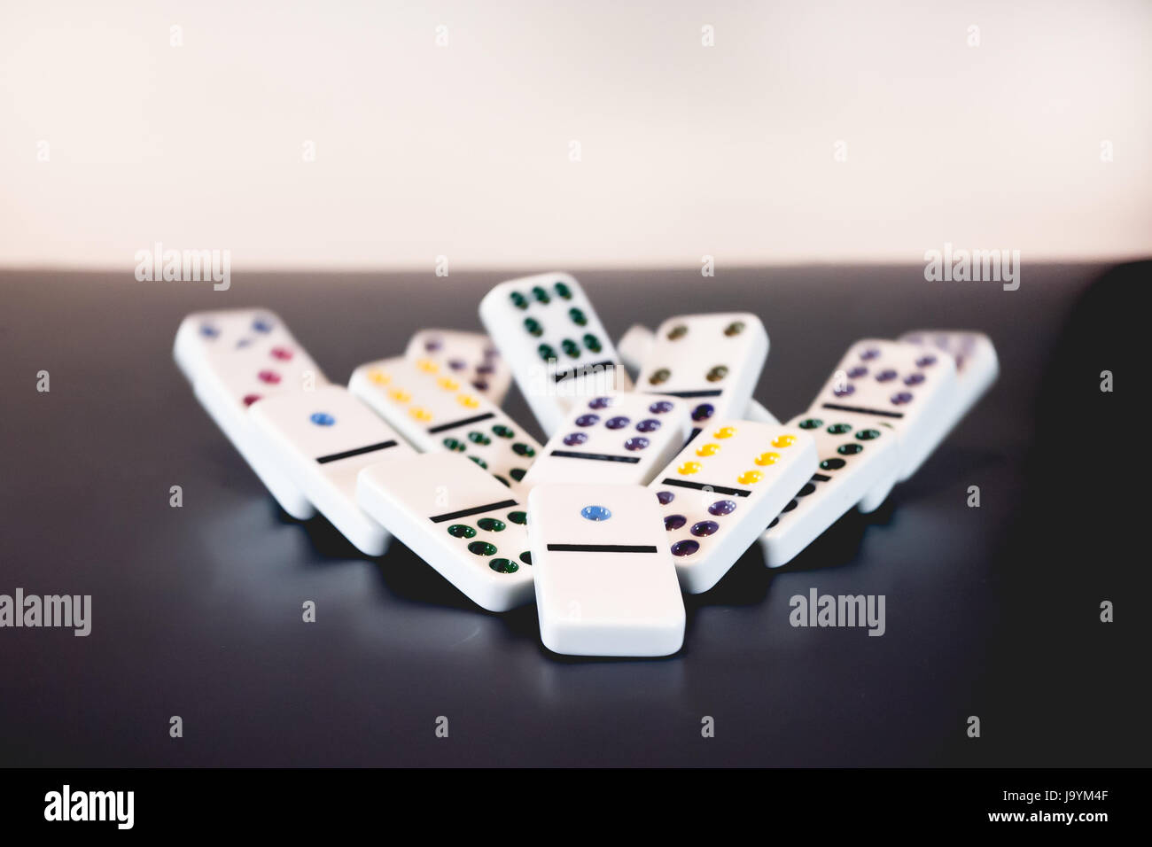 Falling dominos in motion. Stock Photo