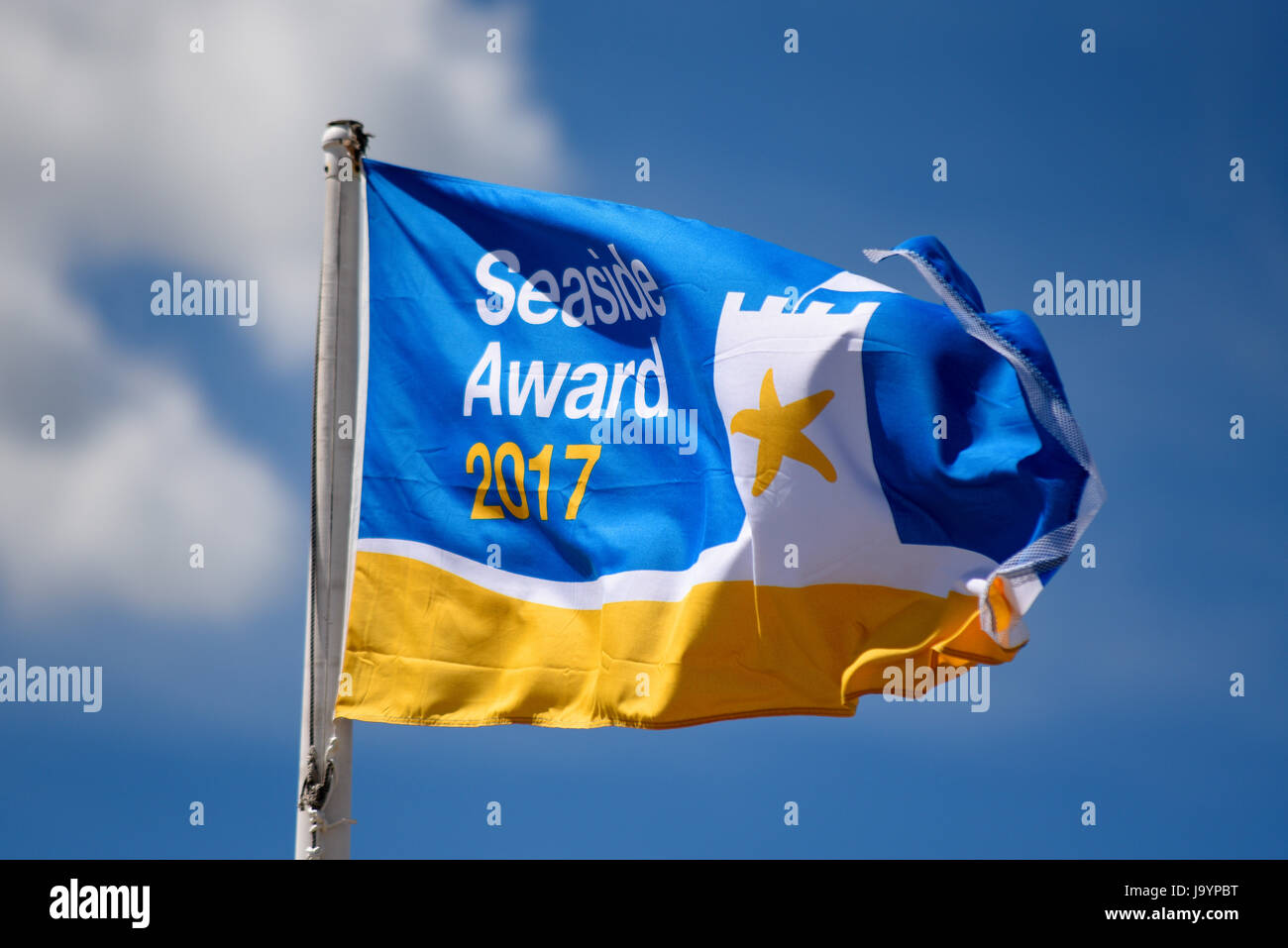 Seaside award 2017 flag for Southend on Sea, Essex, in blue sky. Formerly called the Quality Coast Award Stock Photo