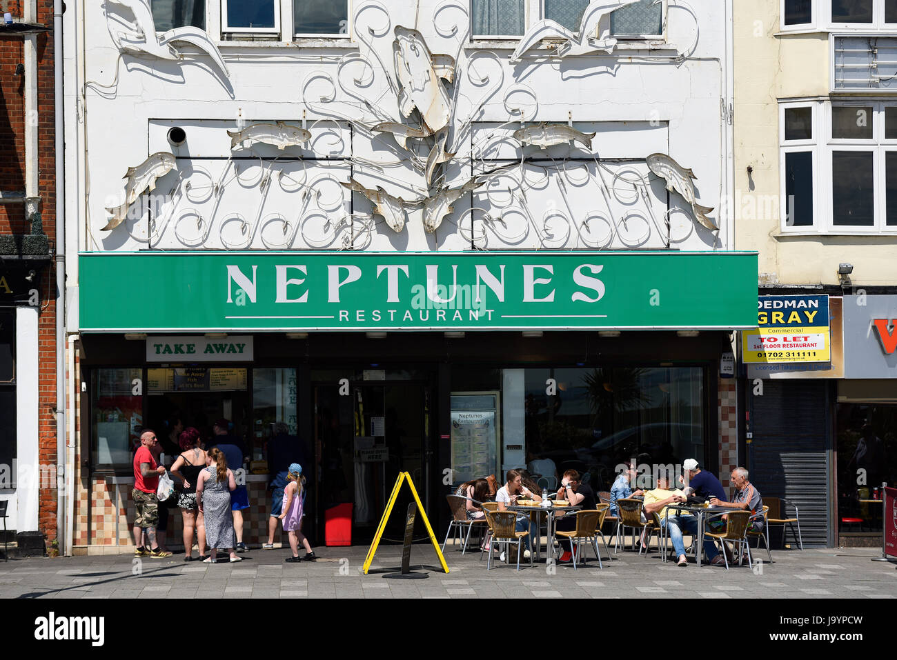 Neptunes Restaurant on Eastern Esplanade Southend on Sea with people dining outside Stock Photo