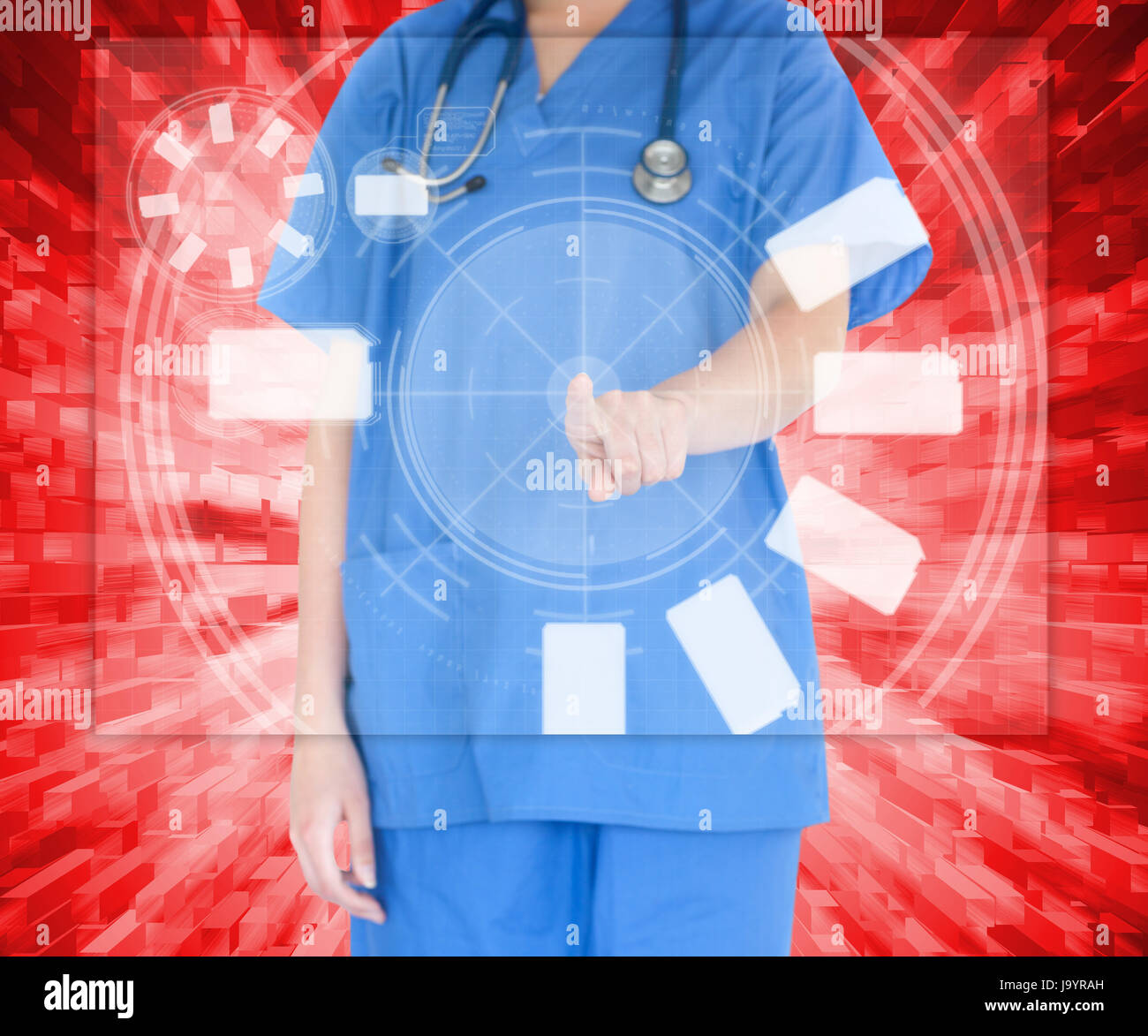 Woman in scrubs with stethoscope on her neck standing against a red