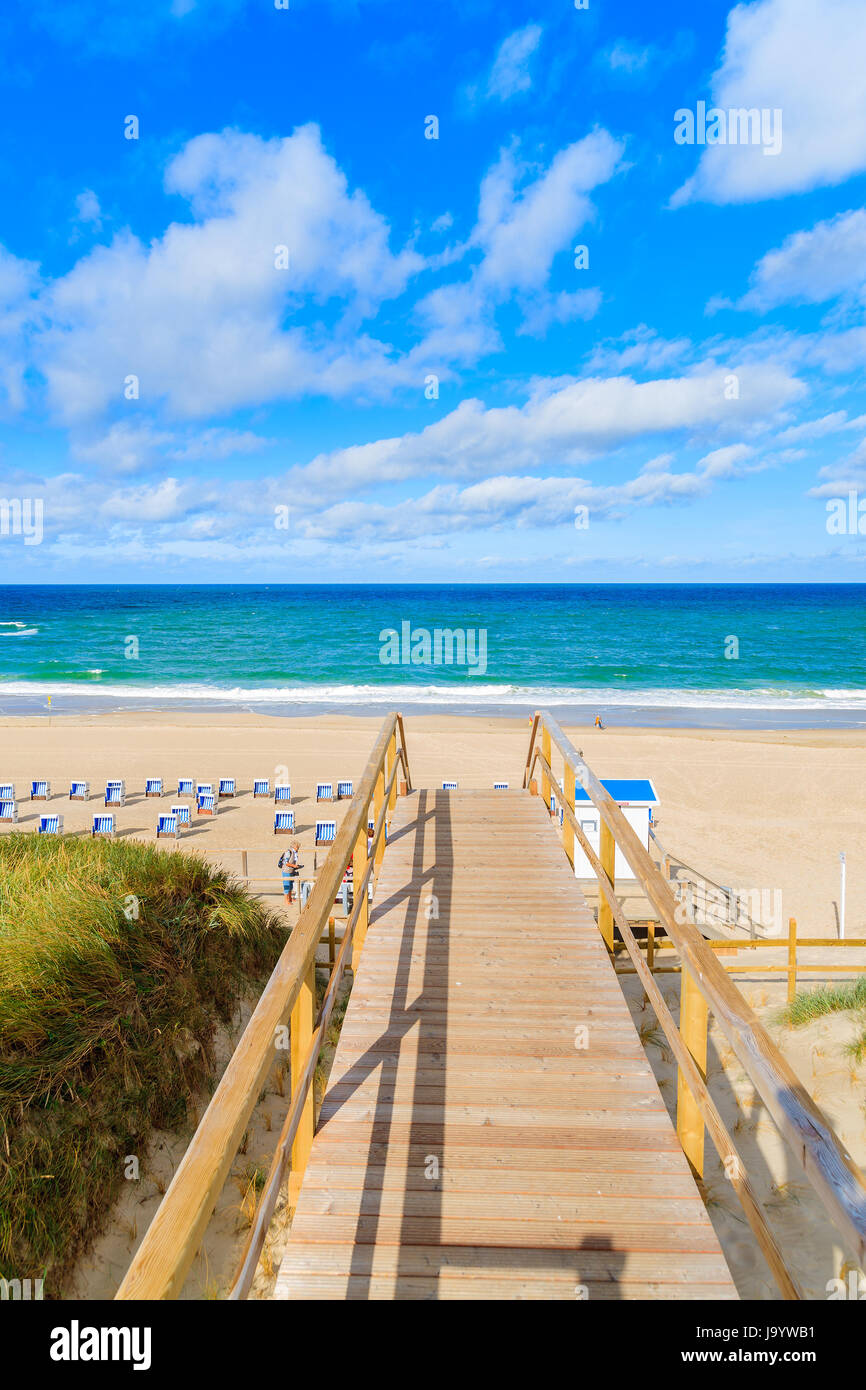Walkway to beautiful beach in Westerland village on Sylt island, North Sea, Germany Stock Photo