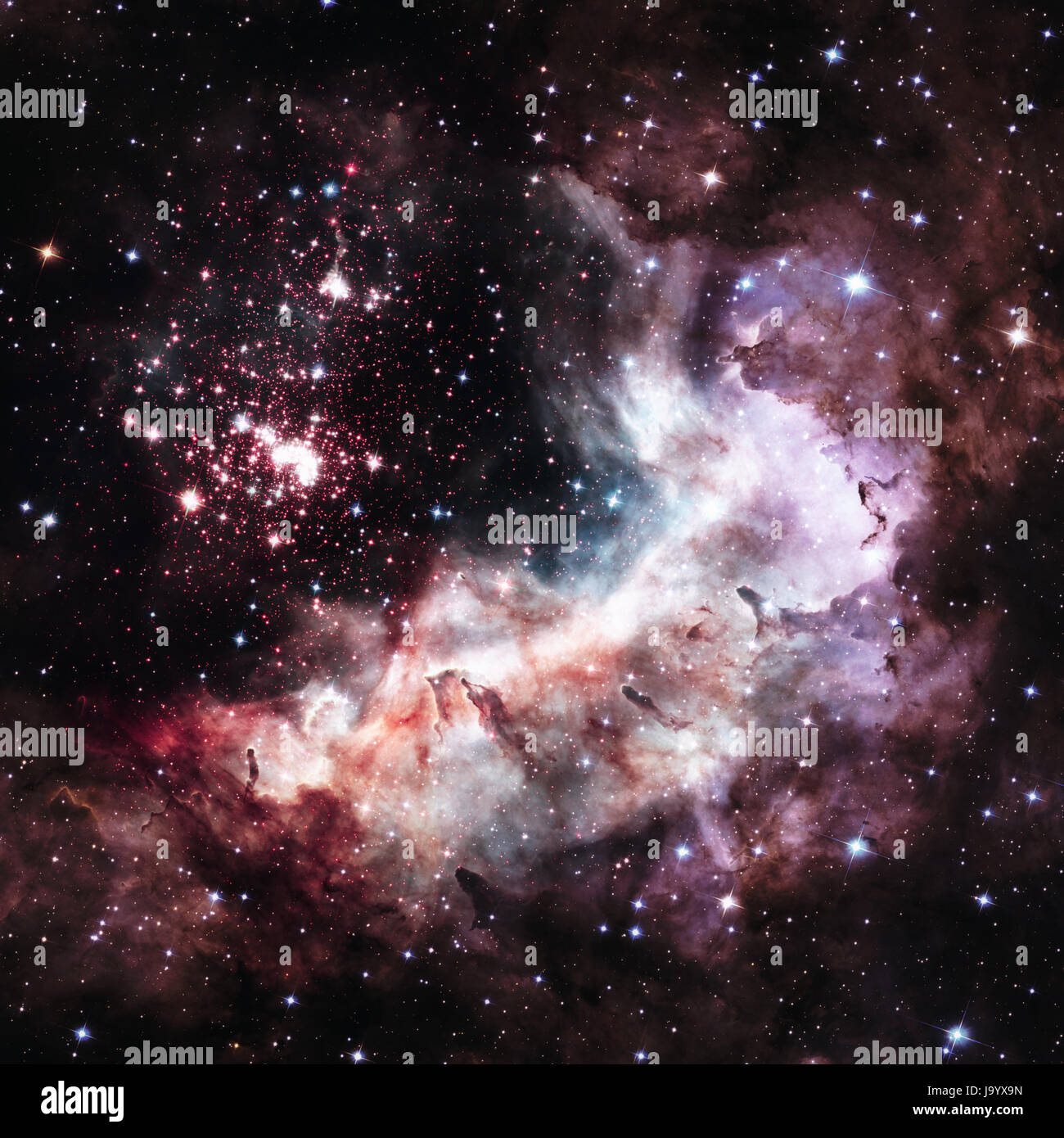 Westerlund 2 is an obscured compact young star cluster in the Milky Way. Super star cluster in the constellation Carina. Retouched image with small DO Stock Photo