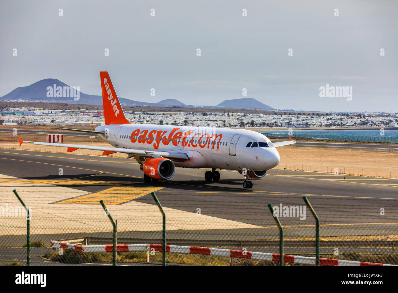 ARECIFE, SPAIN - APRIL, 15 2017: AirBus A320 of easyjet.com ready to take off at Lanzarote Airport Stock Photo