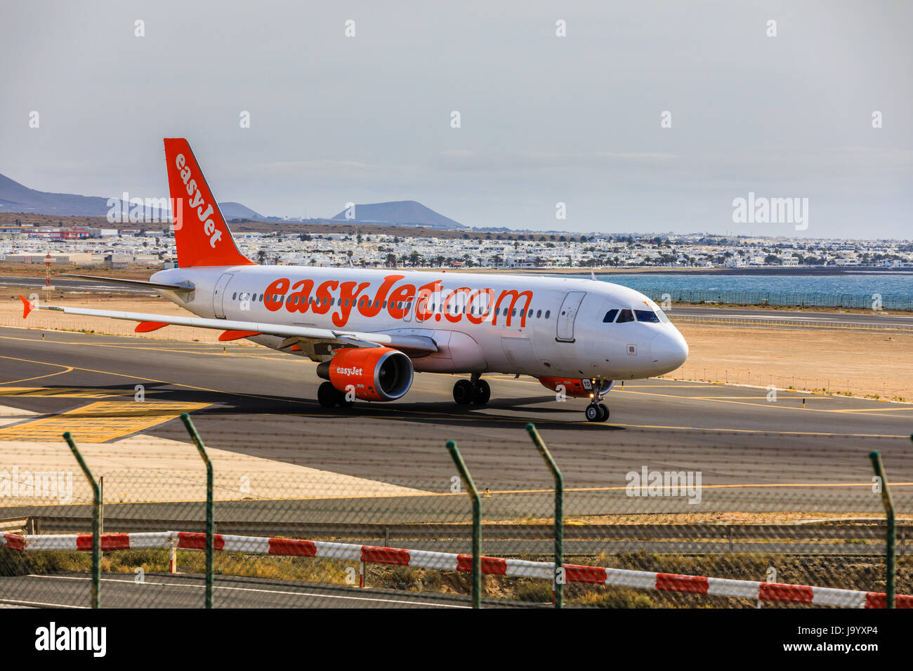ARECIFE, SPAIN - APRIL, 15 2017: AirBus A320 of easyjet.com ready to take off at Lanzarote Airport Stock Photo