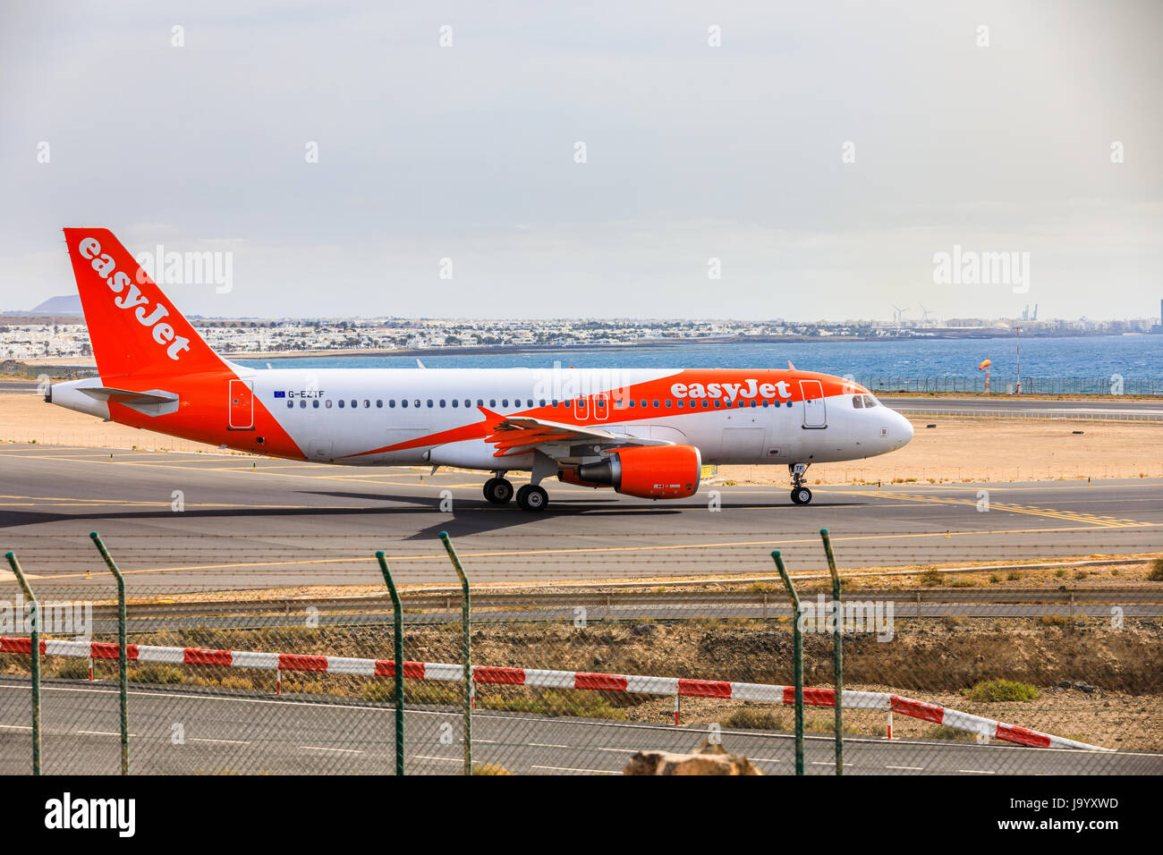 ARECIFE, SPAIN - APRIL, 15 2017: AirBus A319-100 of easyjet ready to take off at Lanzarote Airport Stock Photo