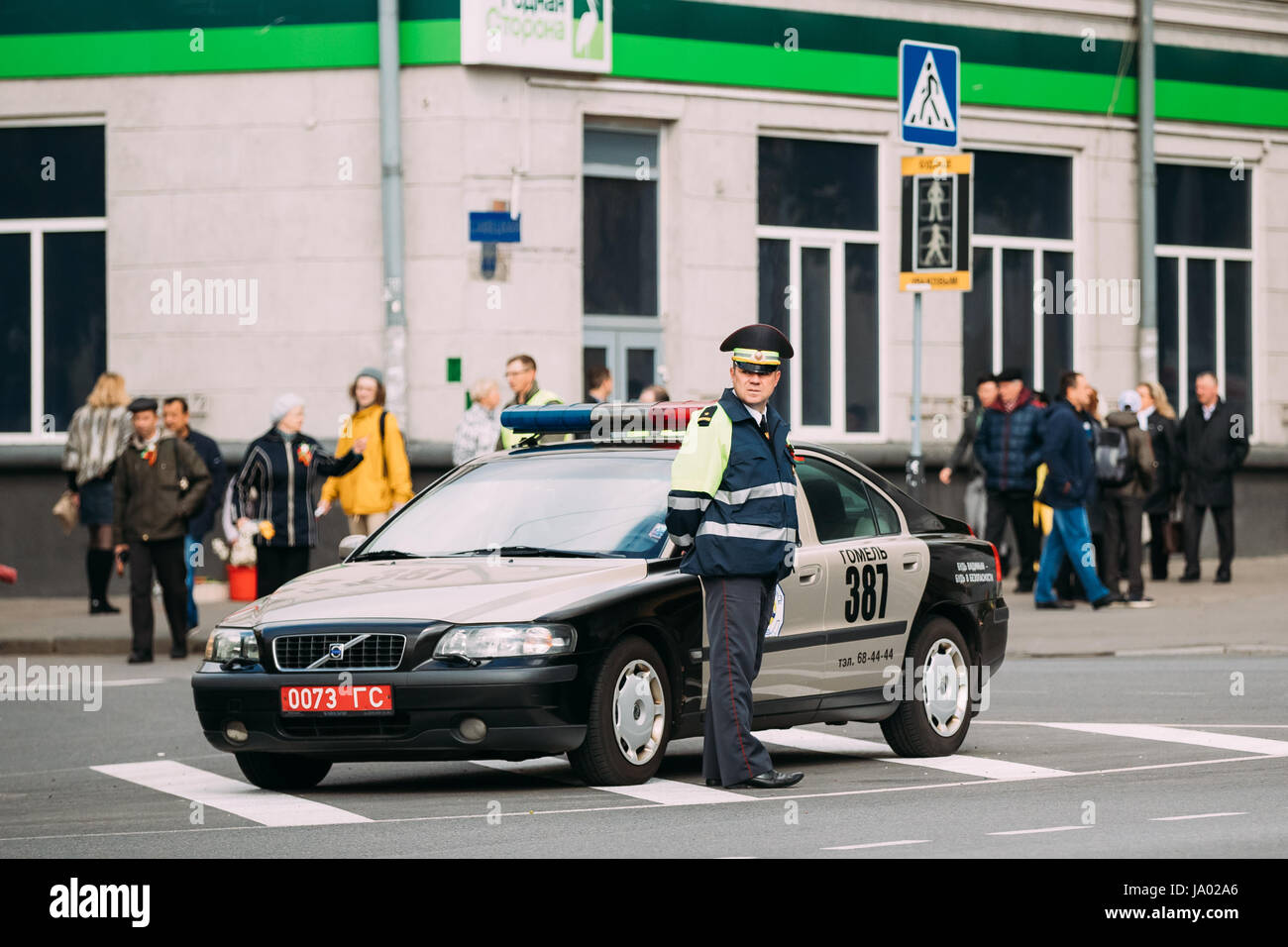 Gomel, Belarus - May 9, 2017: Traffic Road Police Officer Policeman Inspector Regulates Traffic At The Crossroads In Sovetskaya Street Stock Photo