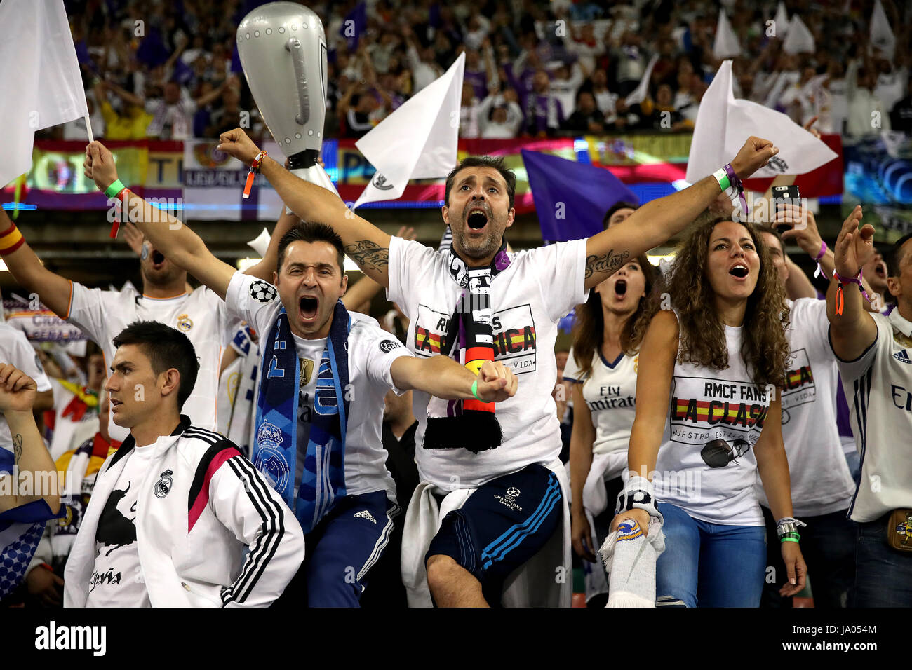 Real Madrid fans show support for their team in the stands during the UEFA  Champions League Final at the National Stadium, Cardiff Stock Photo - Alamy