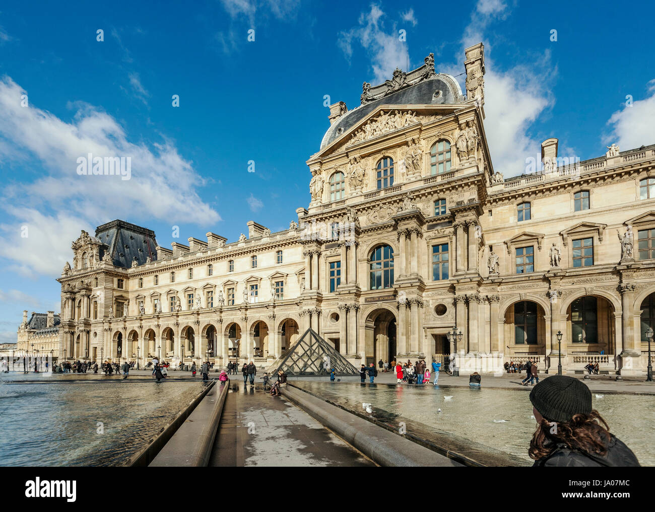 The Louvre Palace, art gallery, Museum and Louvre Pyramid (Pyramide du Louvre), designed by Chinese-American architect I.M. Pei in 1989, Paris, France Stock Photo
