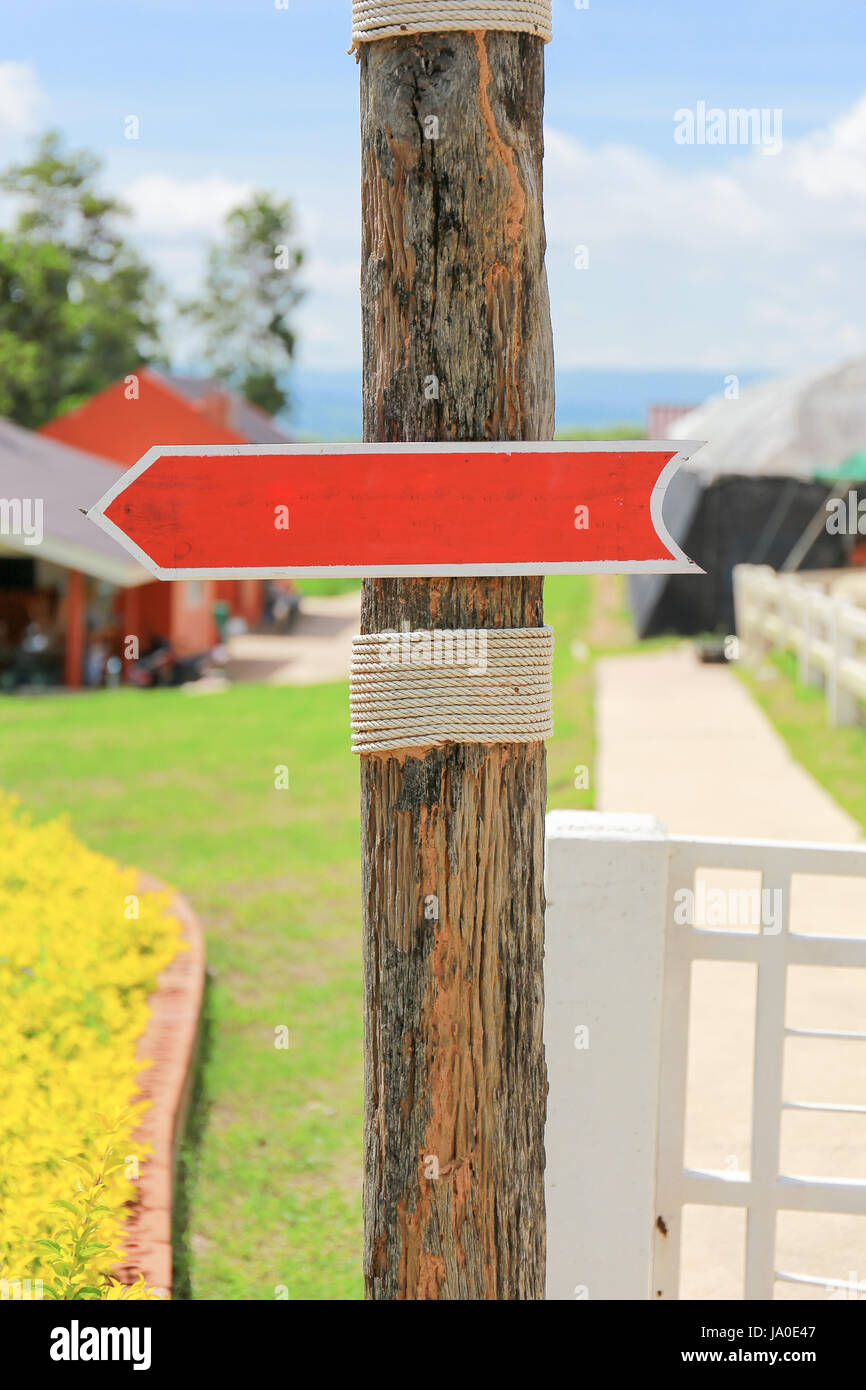 Blank wooden allow pointer red sign for background or text Stock Photo ...
