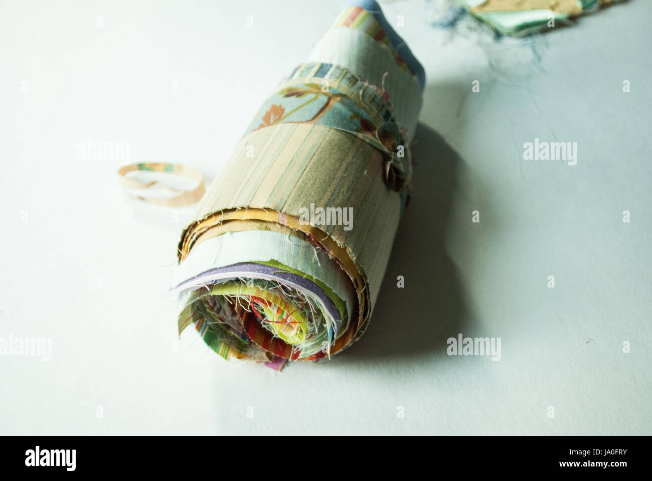 Multiple fabric sheet roll Stock Photo Alamy